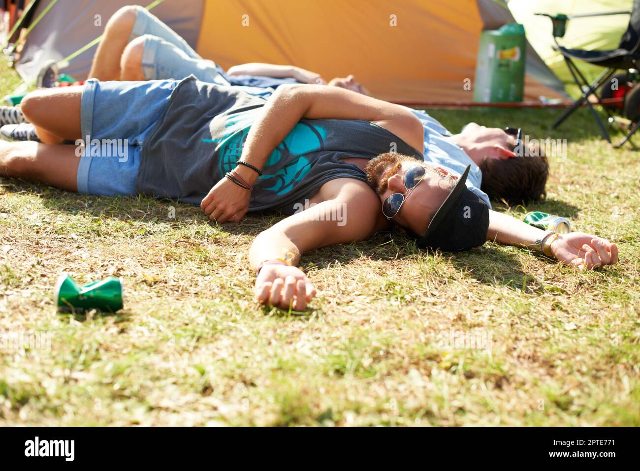 Passes Out Too many beers...a two guys passed out on the grass after drinking too ...