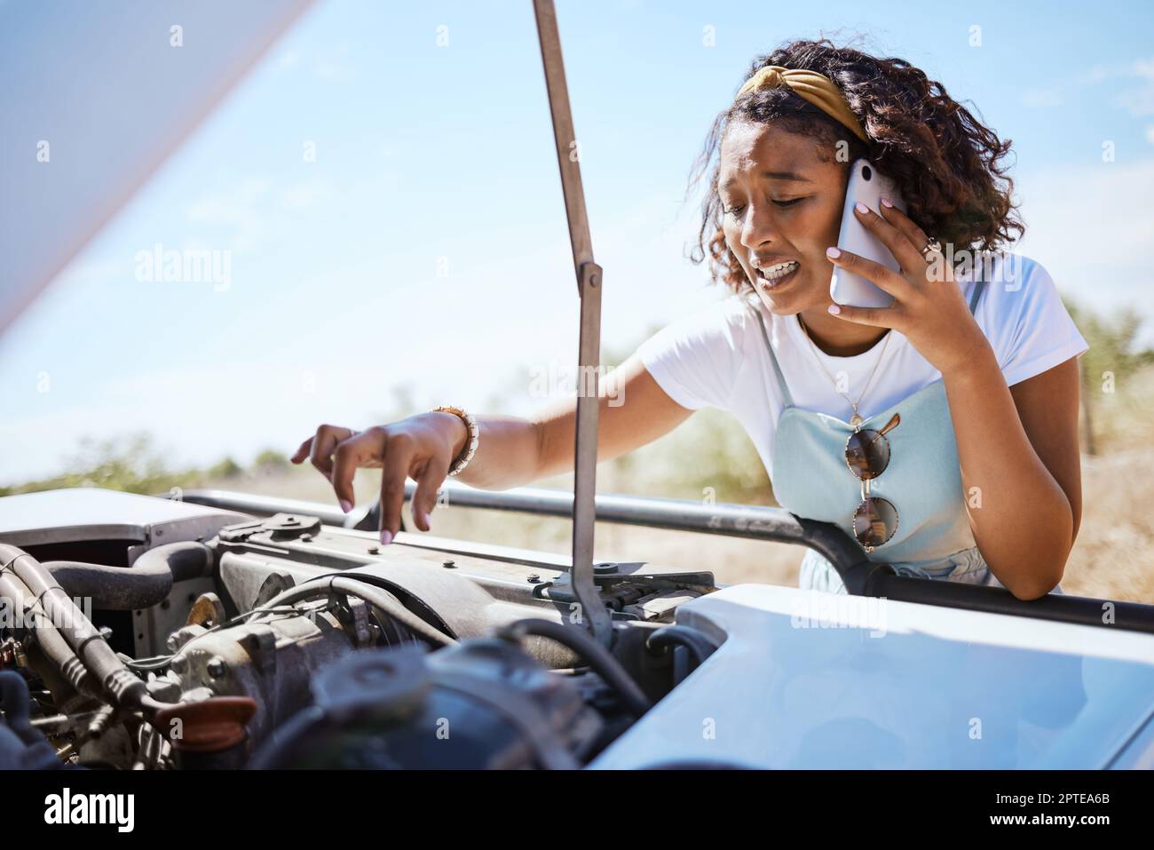 Car trouble, phone call and woman call for help on road trip 