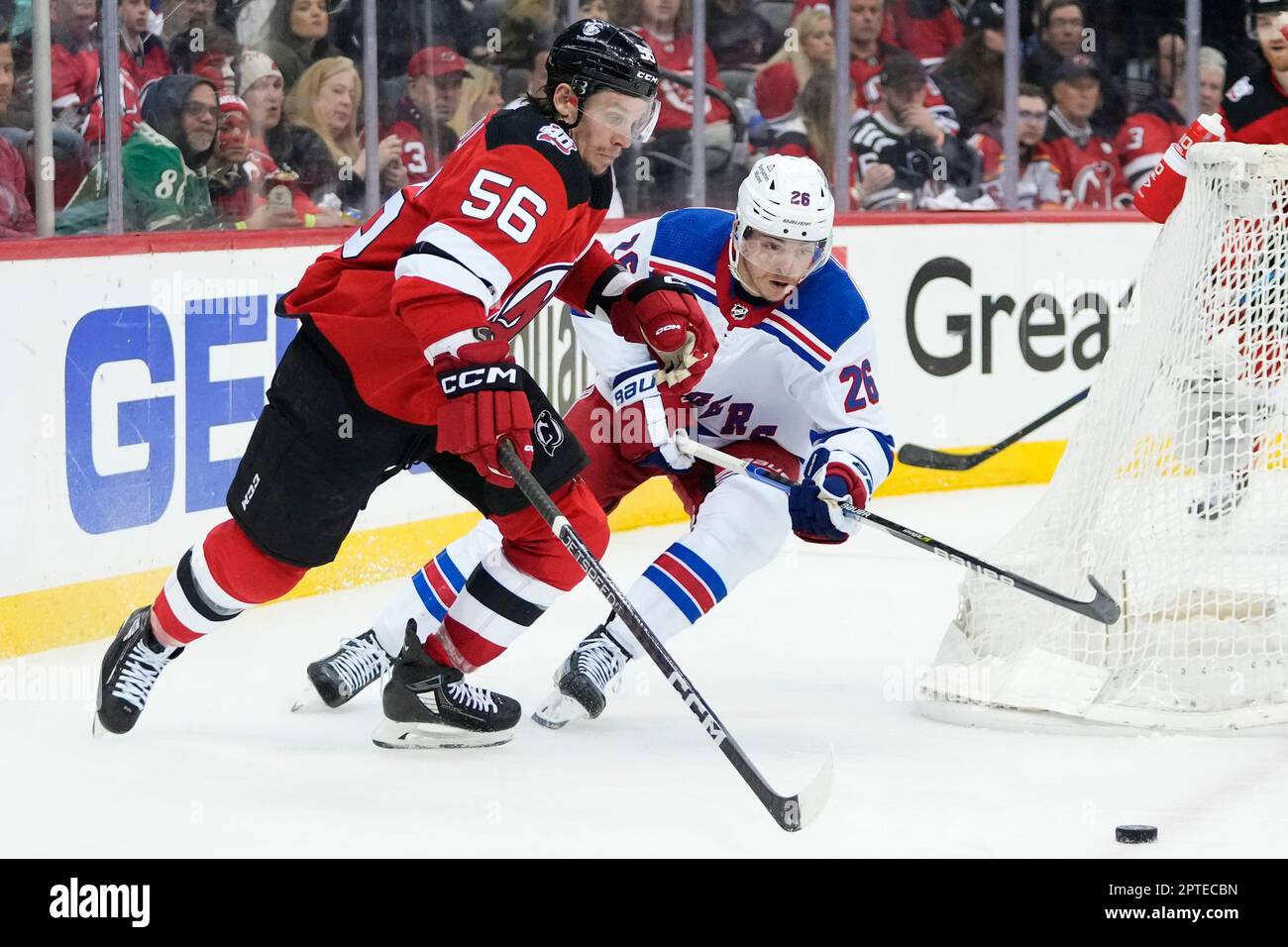 New Jersey Devils' Erik Haula (56) fights for control of the puck