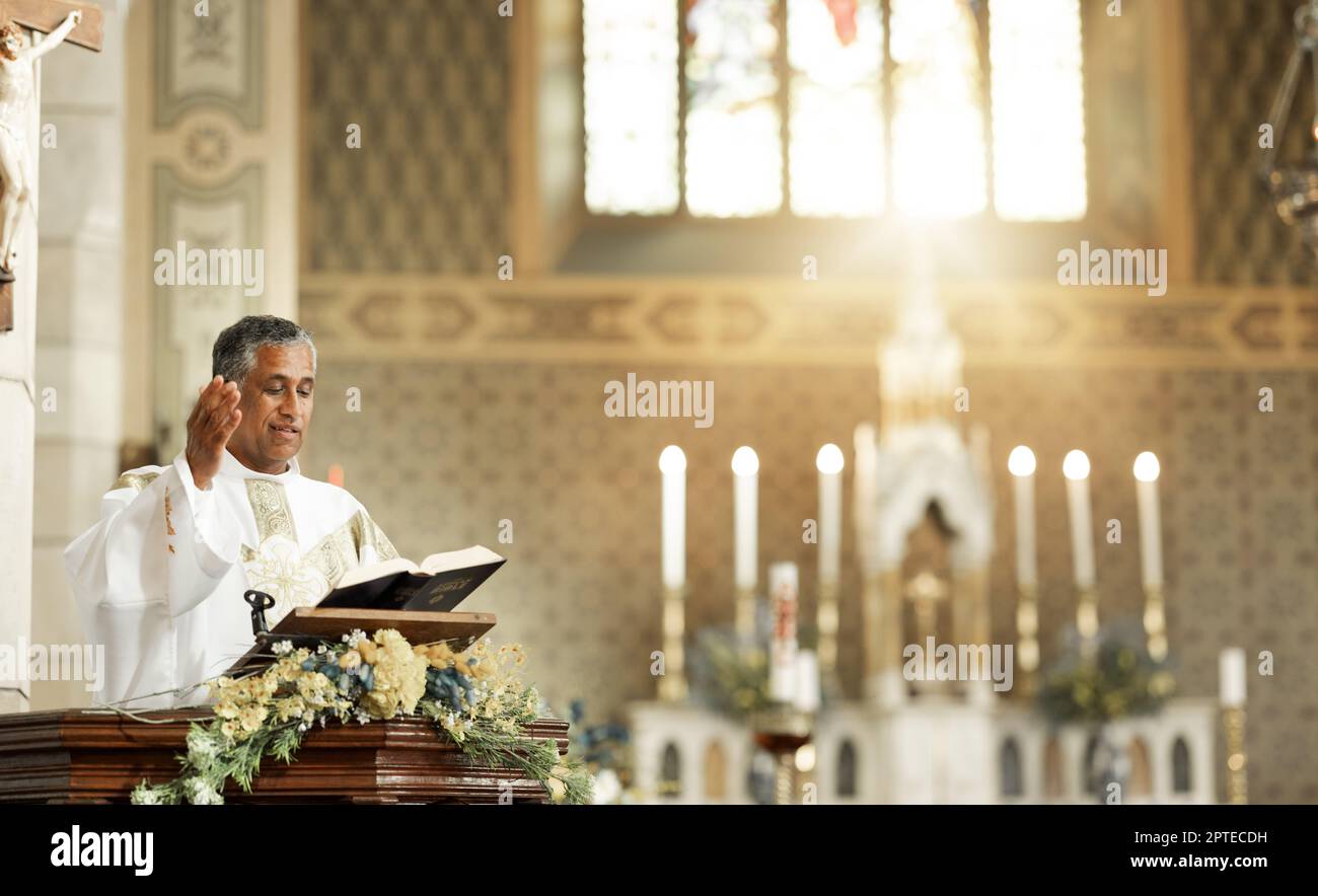 Pastor on church podium praying for bible prayer, worship or leadership