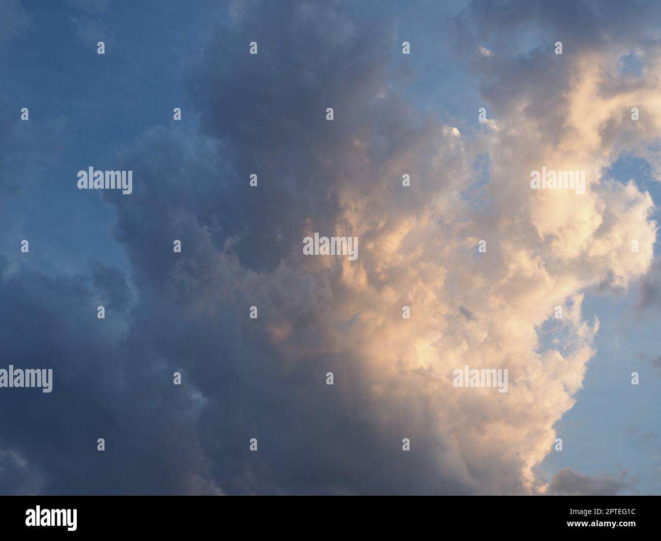 dramatic stormy blue sky with dark clouds at sunset useful as a ...