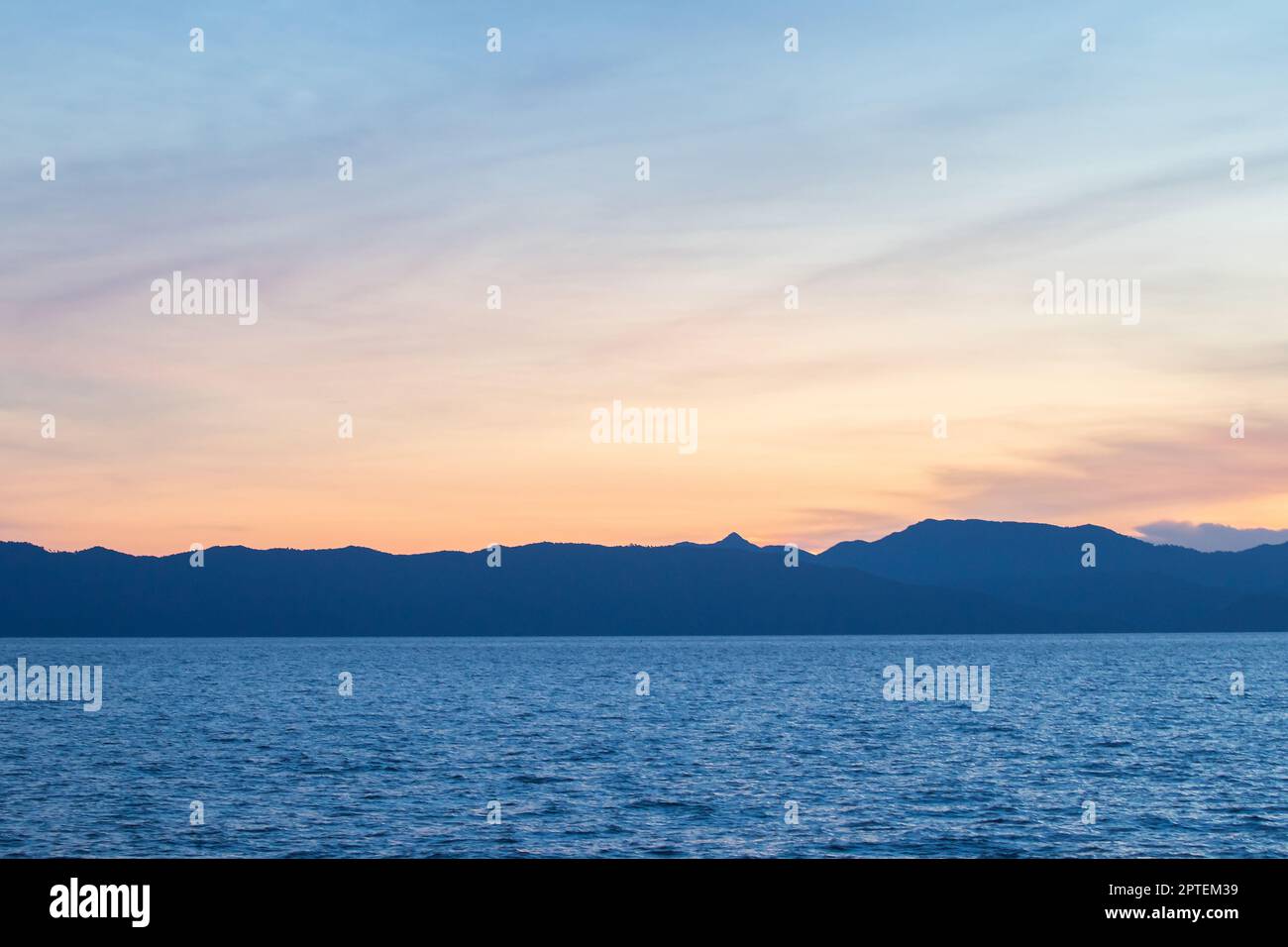 Twilight light of the sunset with beautiful sea landscape Stock Photo ...