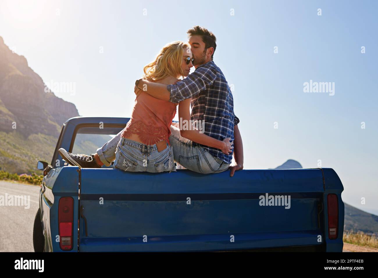 Theres nothing greater than the open road. a young couple relaxing on