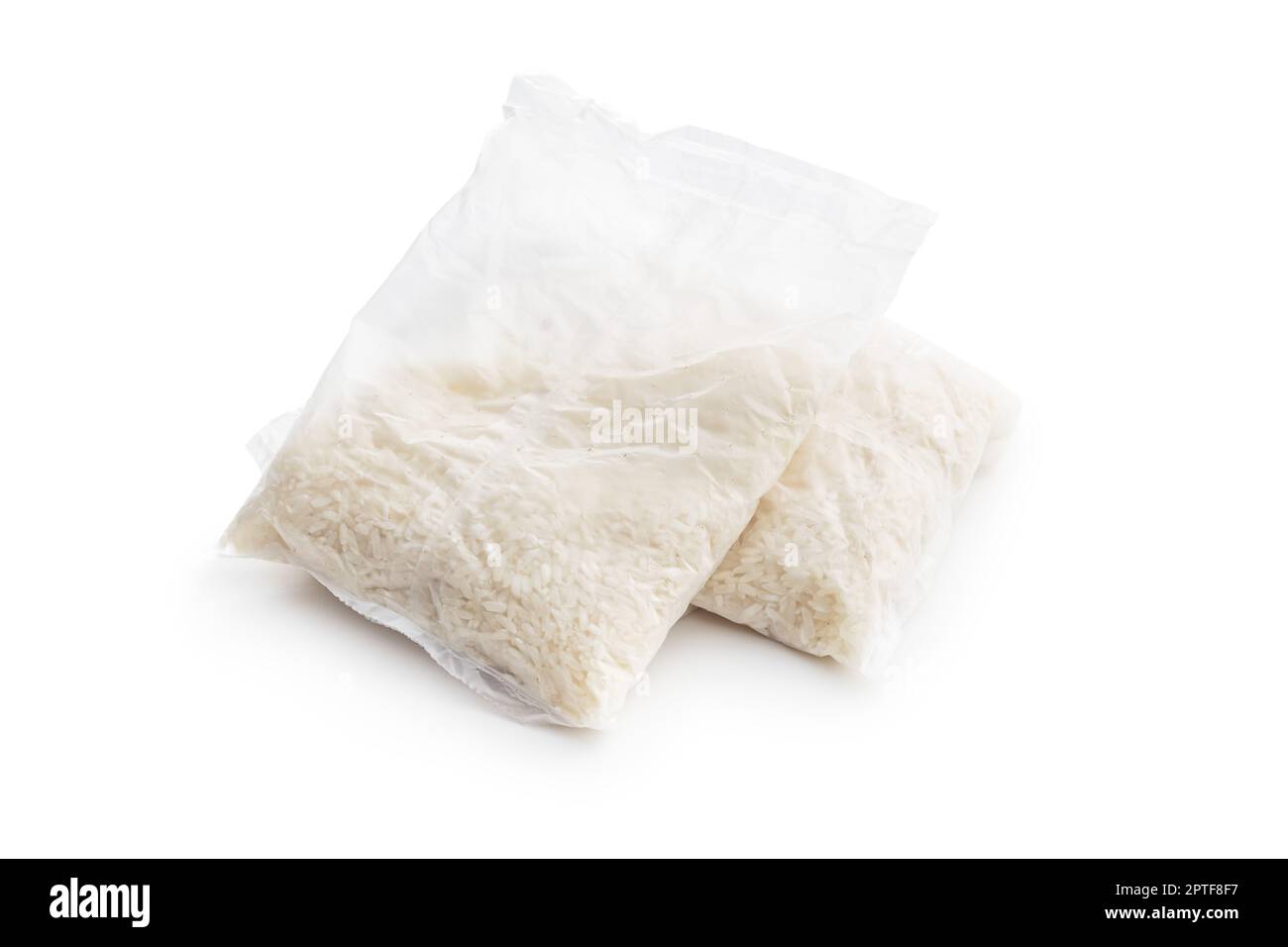 Uncooked rice in the cooking sack isolated on white background Stock ...