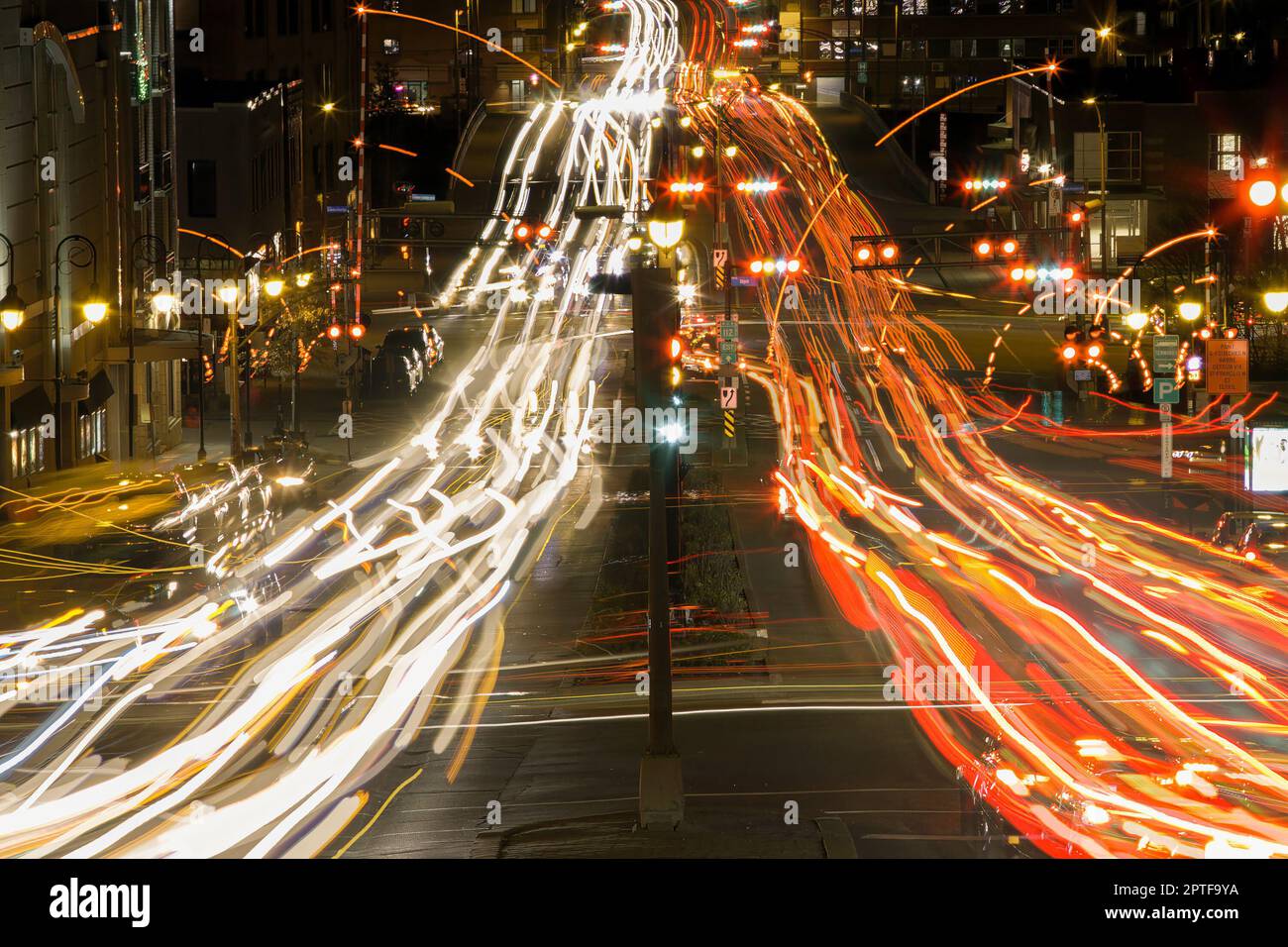 rush hour traffic time lapse Sherbrooke city Quebec Canada urban motion speed street long lights exposure Stock Photo