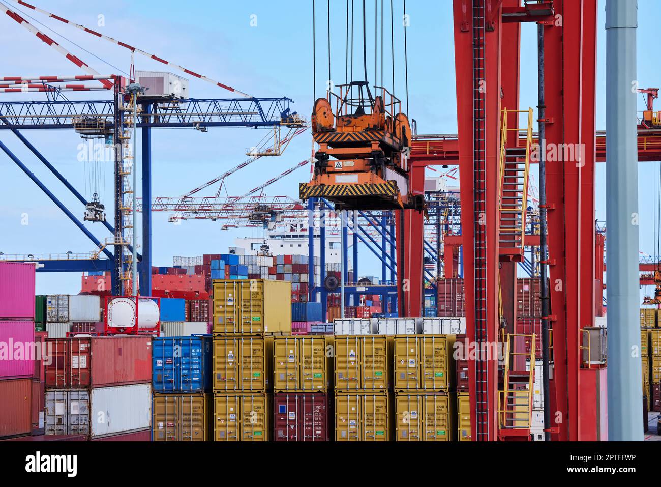 Industrial container cargo crane, commercial trade and or international export and import warehouse. Commercial logistics, industry inventory and glob Stock Photo