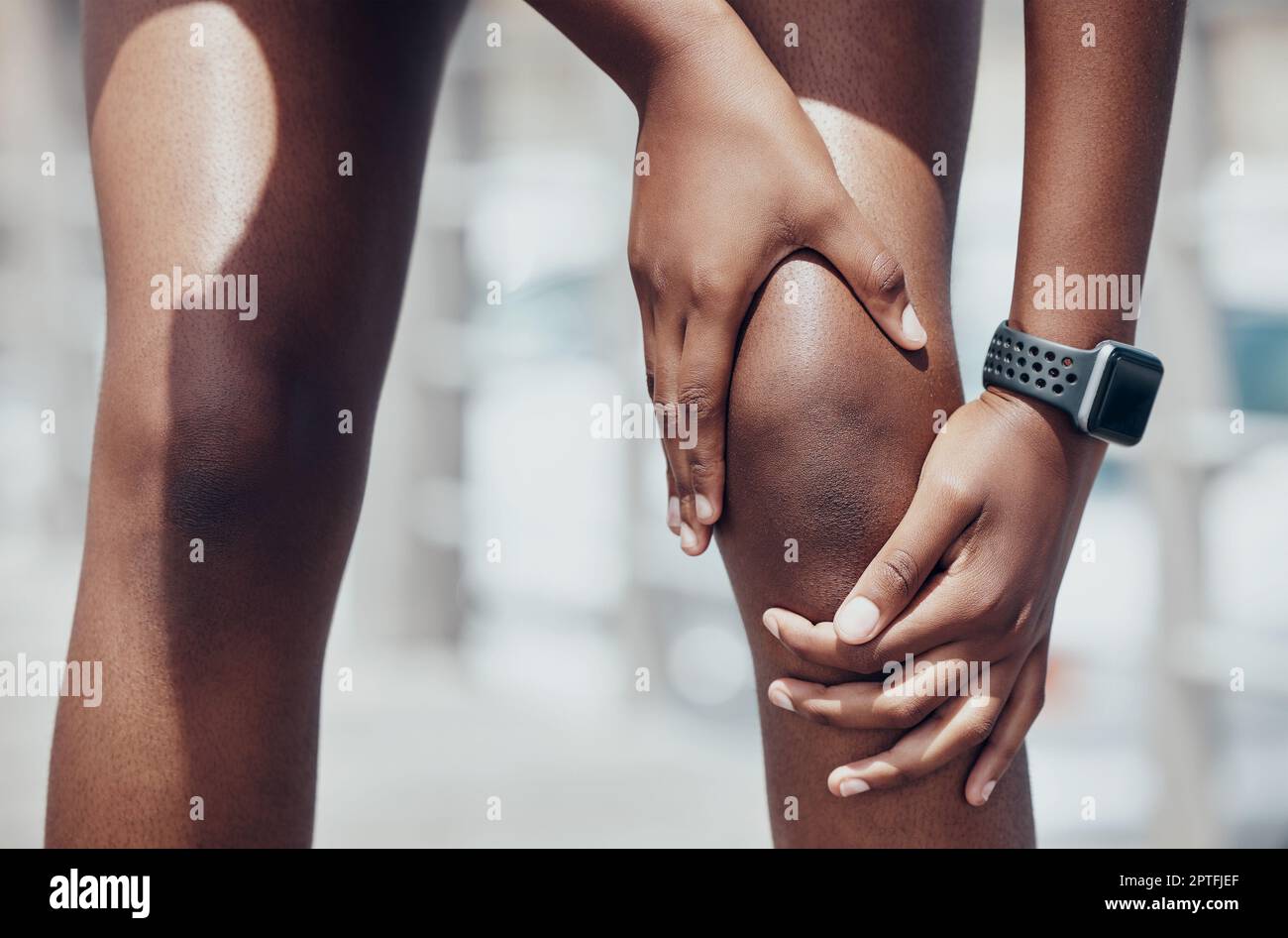 Knee injury, pain and woman athlete touch painful strain while training