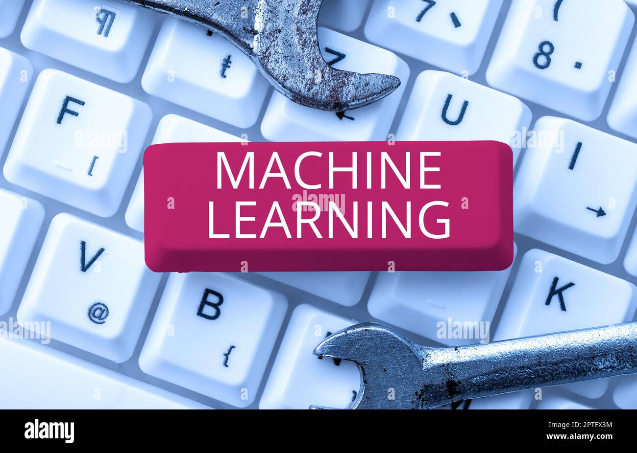 Hand writing sign Machine Learning, Business approach the concept that a computer can learn new data itself Stock Photo