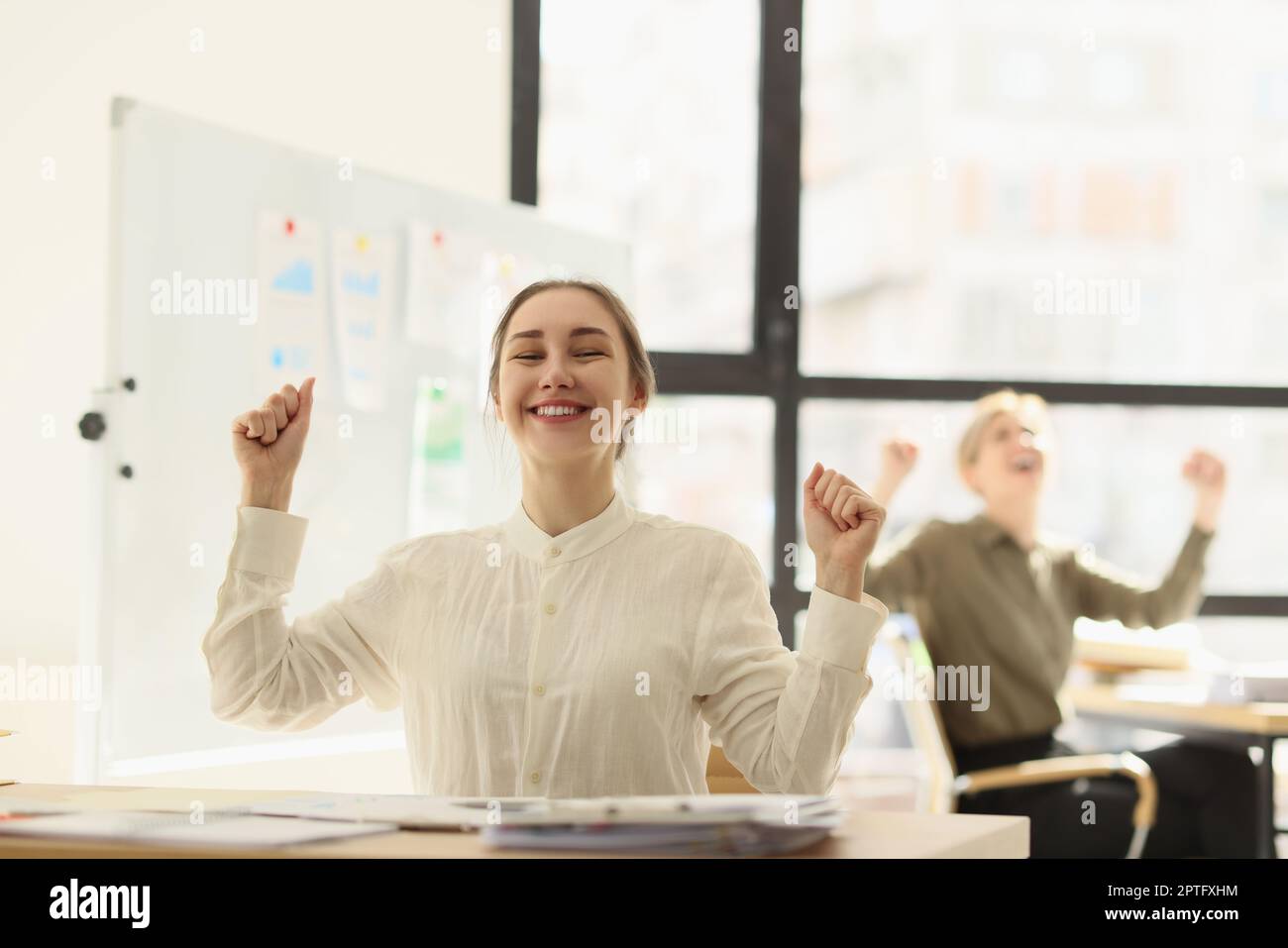Cheerful happy employee smiles hi-res stock photography and images - Alamy