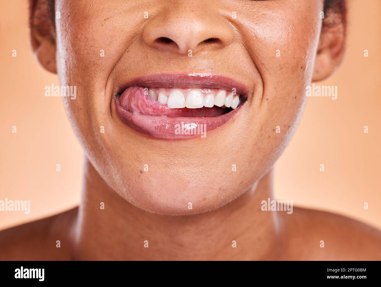 Woman, mouth and smile with teeth for dental care, cosmetics or surgery against a studio background. Female smiling in satisfaction for medical tooth, Stock Photo