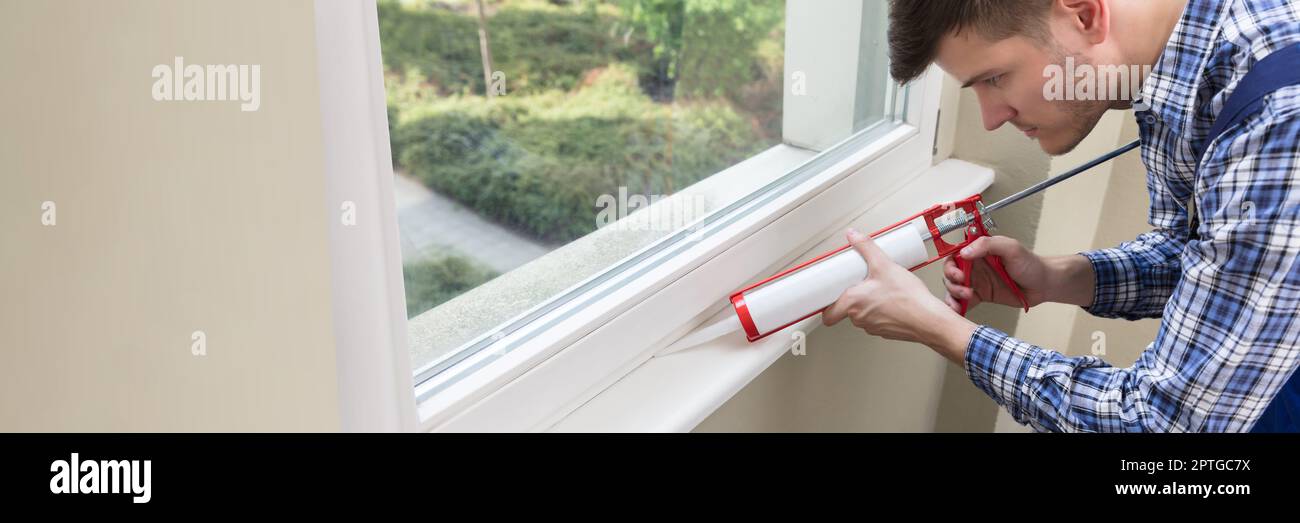 Caulking Silicone Sealant To Repair Window In House Stock Photo Alamy