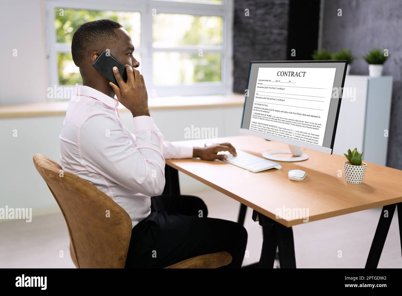 Legal Law Contract On Desktop Computer Screen Stock Photo