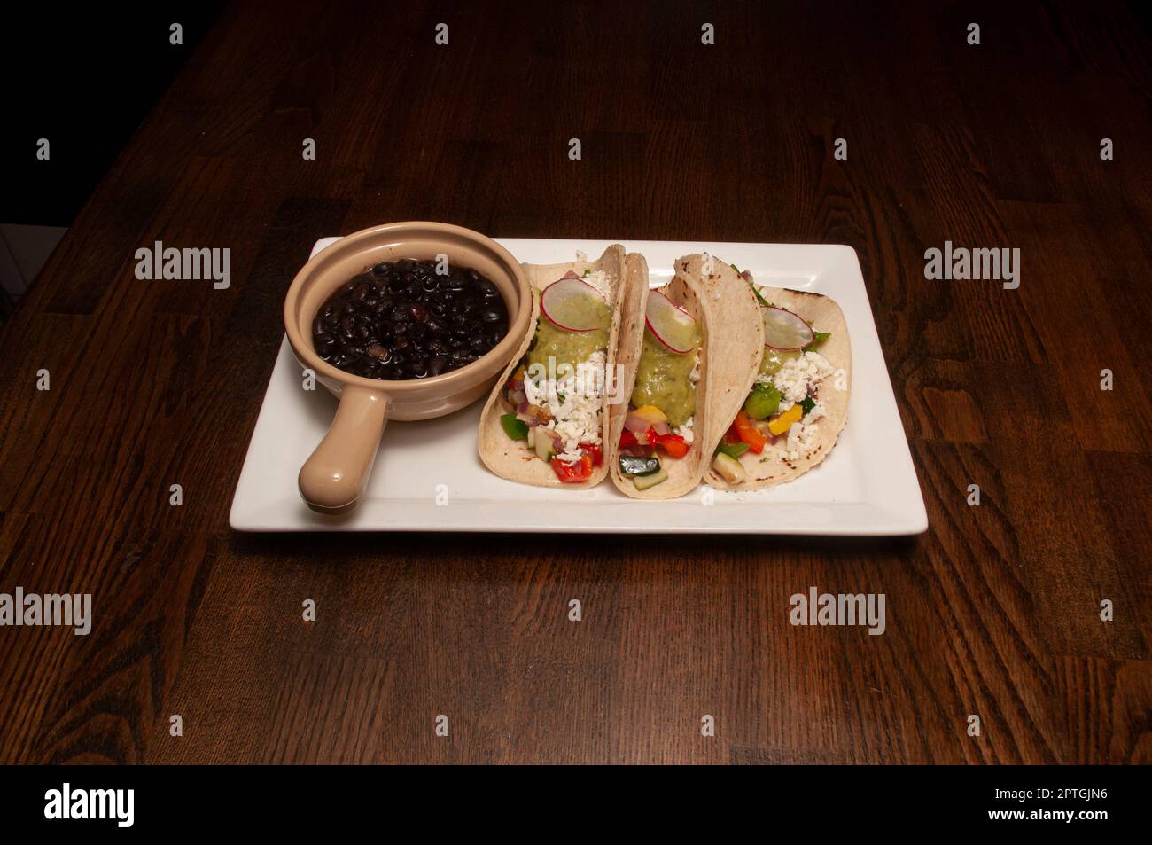 Authentic tex mex mexican cuisine known as vegetarian tacos Stock Photo