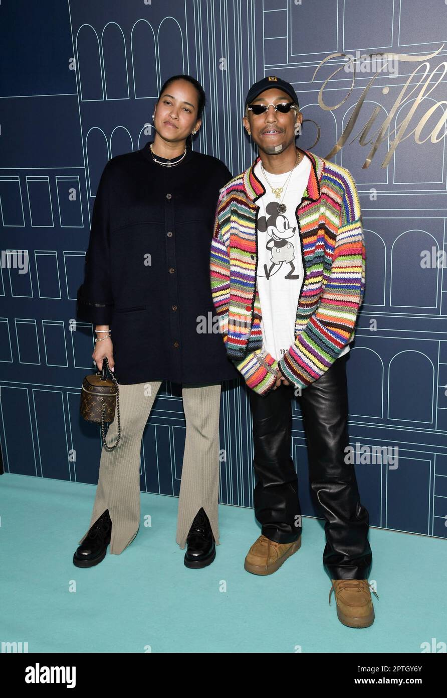 Pharrell Williams, right, and wife Helen Williams attend the Tiffany & Co.  Fifth Avenue flagship store grand re-opening event on Thursday, April 27,  2023, in New York. (Photo by Evan Agostini/Invision/AP Stock