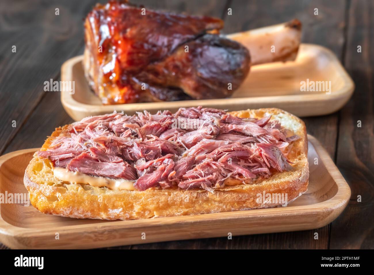 Sandwich with ham hock meat on the plate Stock Photo