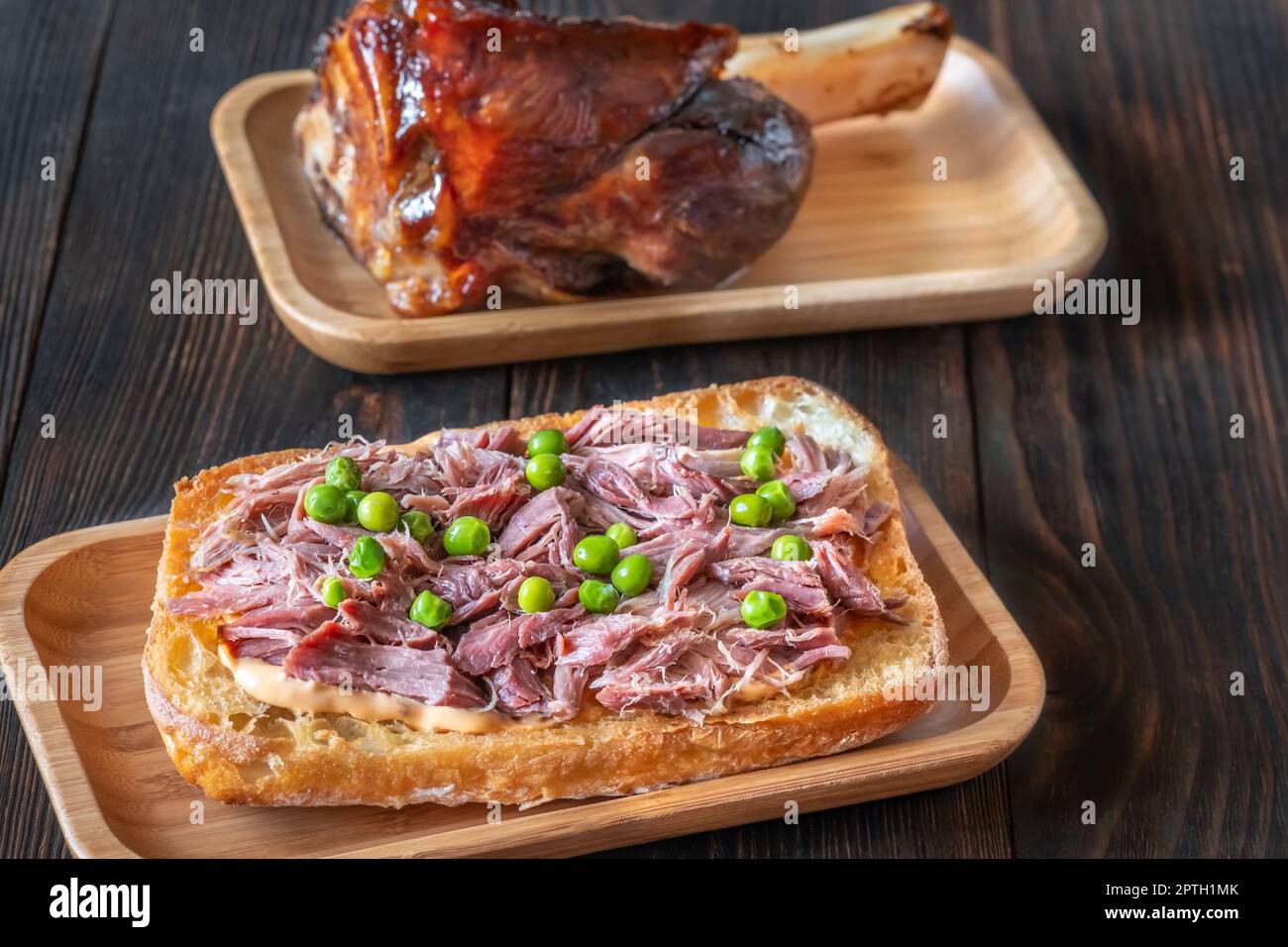 Sandwich with ham hock meat on the plate Stock Photo