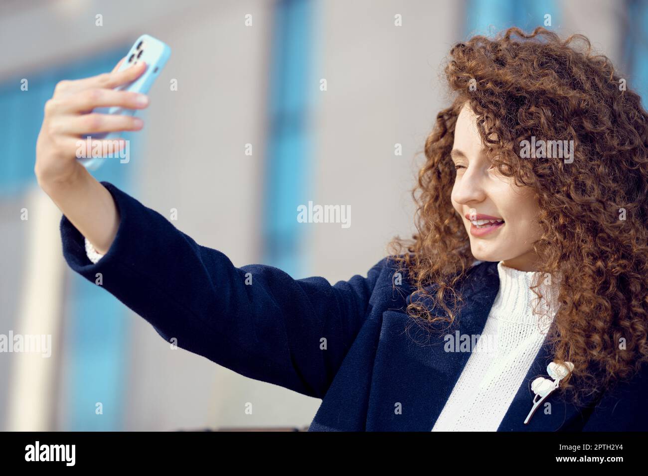 Woman curly hair makes hi-res stock photography and images - Alamy