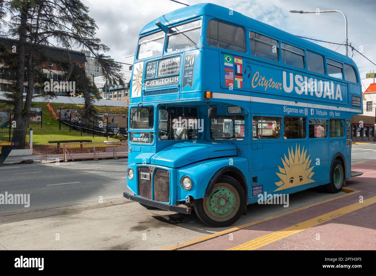 Parked Blue Double Decker City Bus Waiting for Tourists for hour long tour of Ushuaia, Argentina, Tierra Del Fuego Patagonian Capital Stock Photo