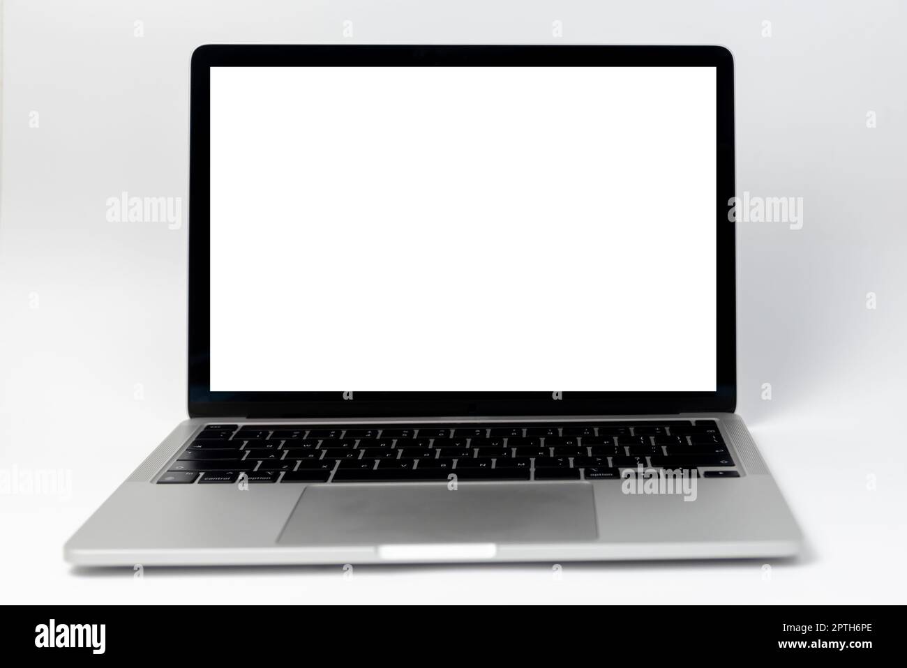 laptop computer frame with isolated white background blank screen. template presentation and advertisement. Stock Photo