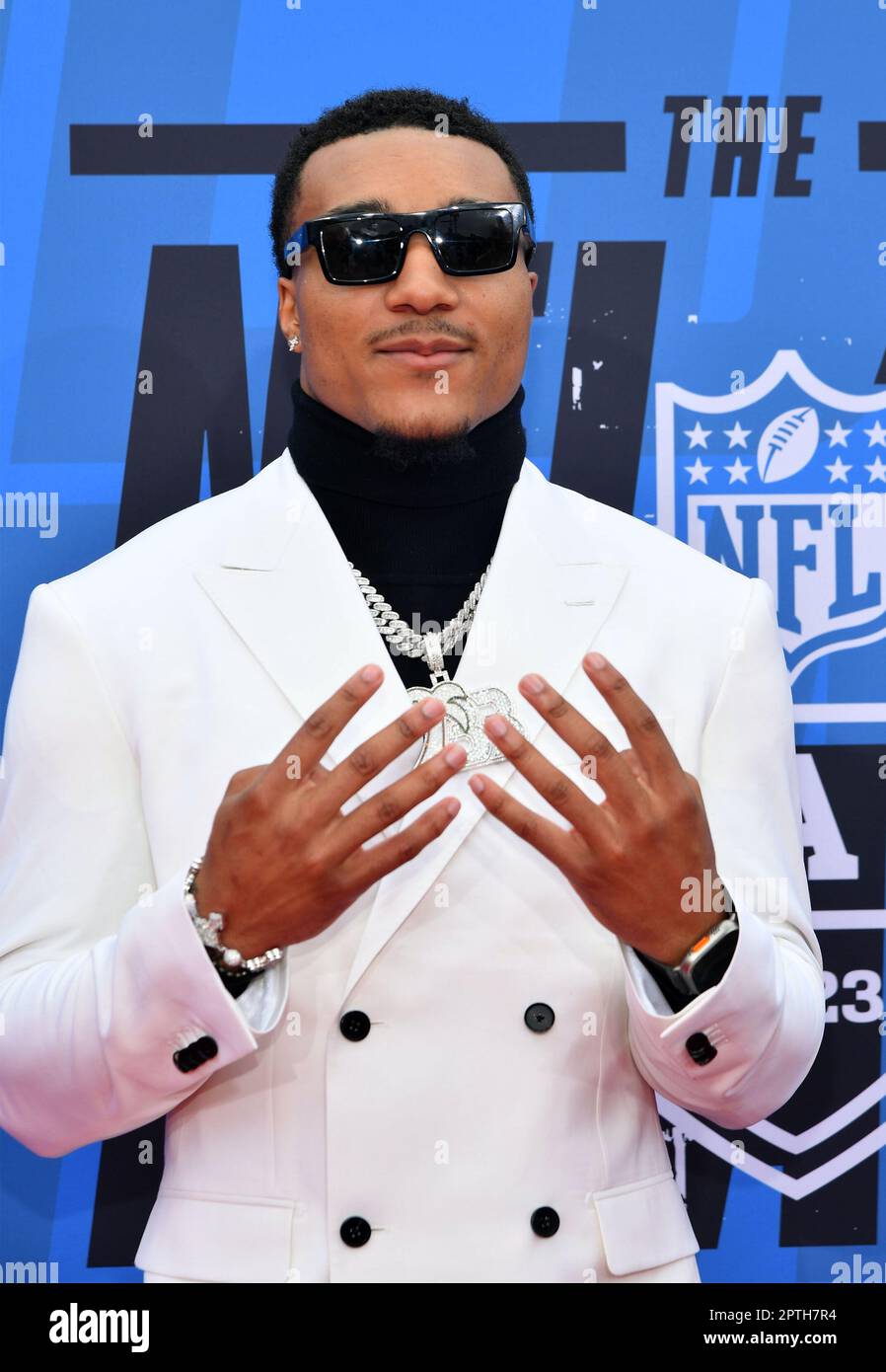 Brian Branch walks the red carpet of the 2023 NFL Draft at the National