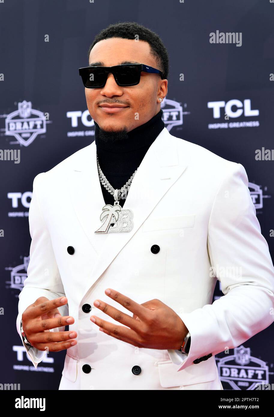 Brian Branch walks the red carpet of the 2023 NFL Draft at the National
