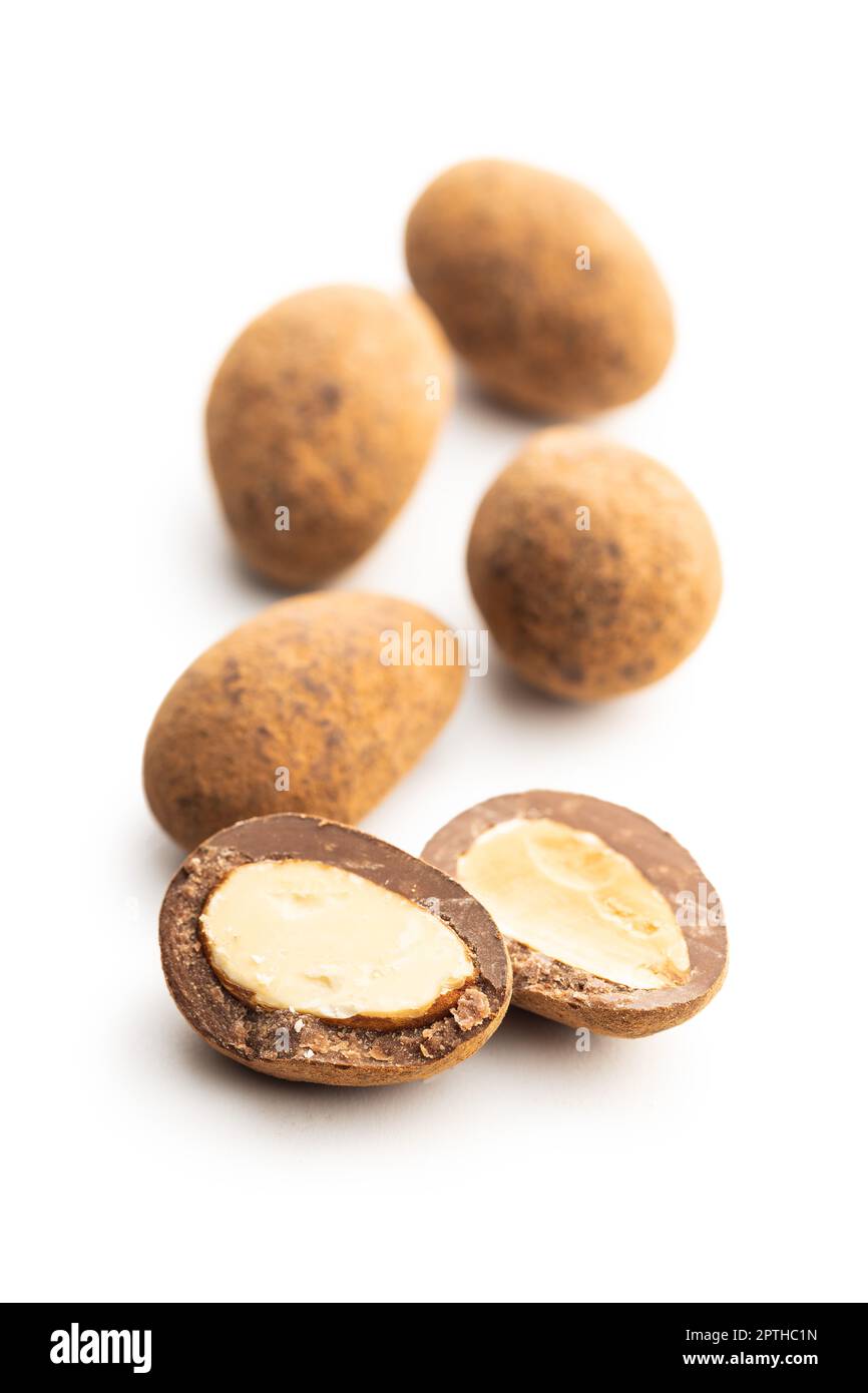 Almonds in chocolate coated in cocoa powder isolated on a white background. Stock Photo