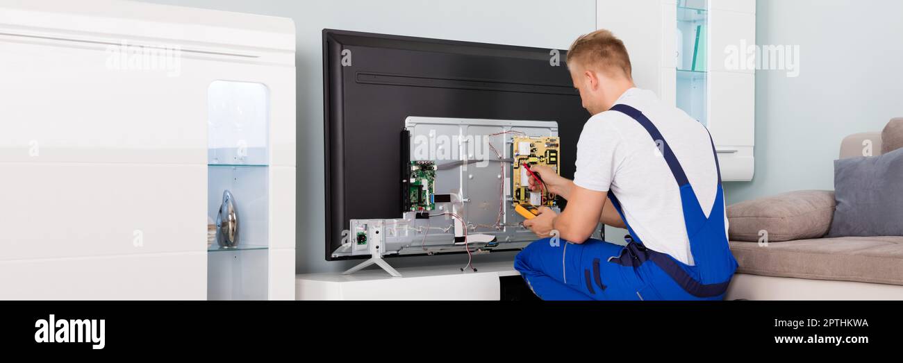 Television Repair. TV Appliance Screen Check Test Stock Photo Alamy