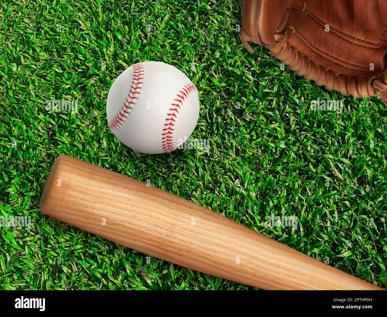 baseball, glove, ball and bat on field Stock Photo Alamy