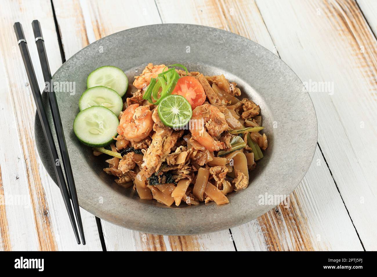 Stir Fried Chinese Flat Rice Noodle or Char Kway Teow or Kwetiau with