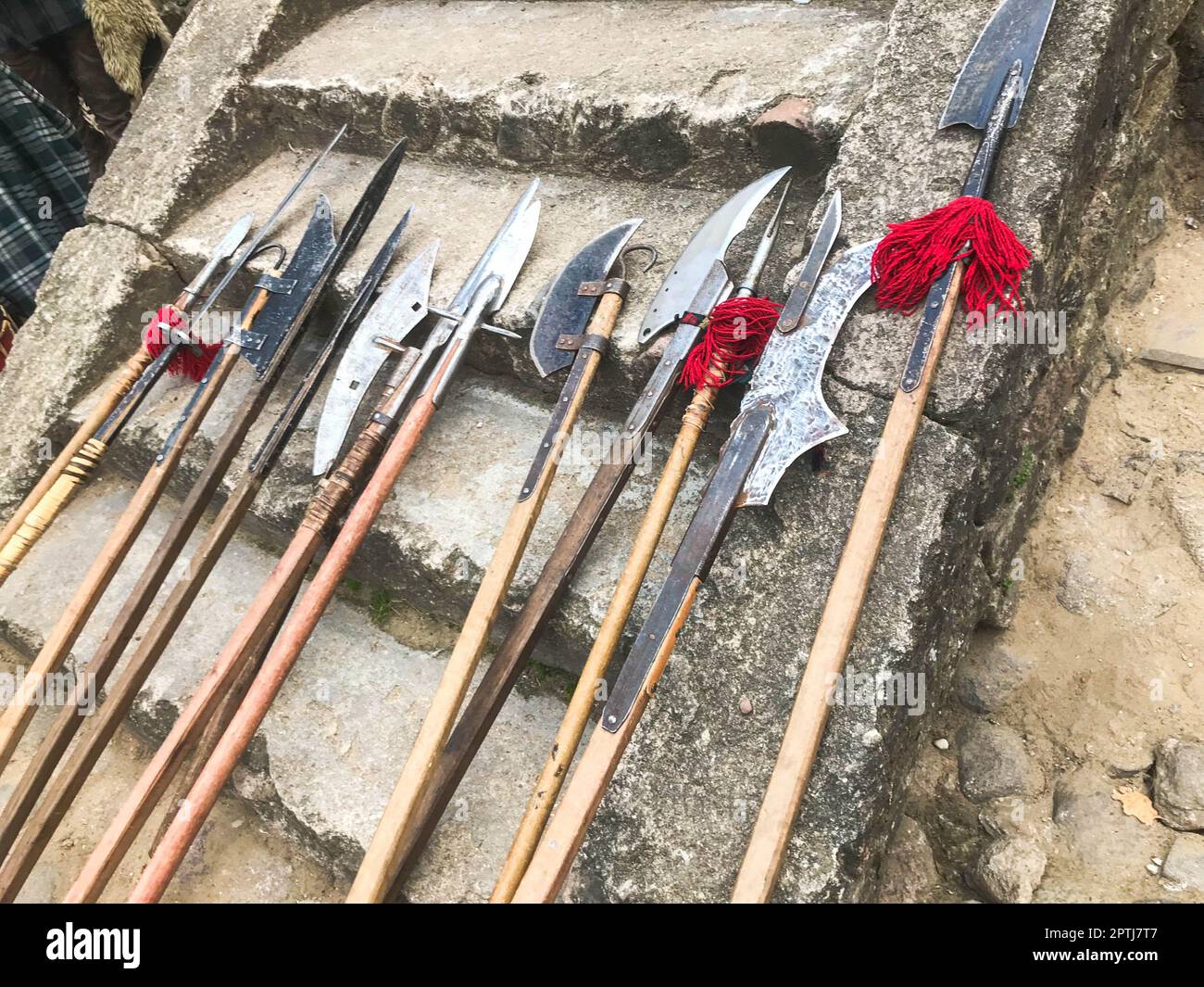 The old ancient medieval cold weapons, axes, halberds, knives, swords