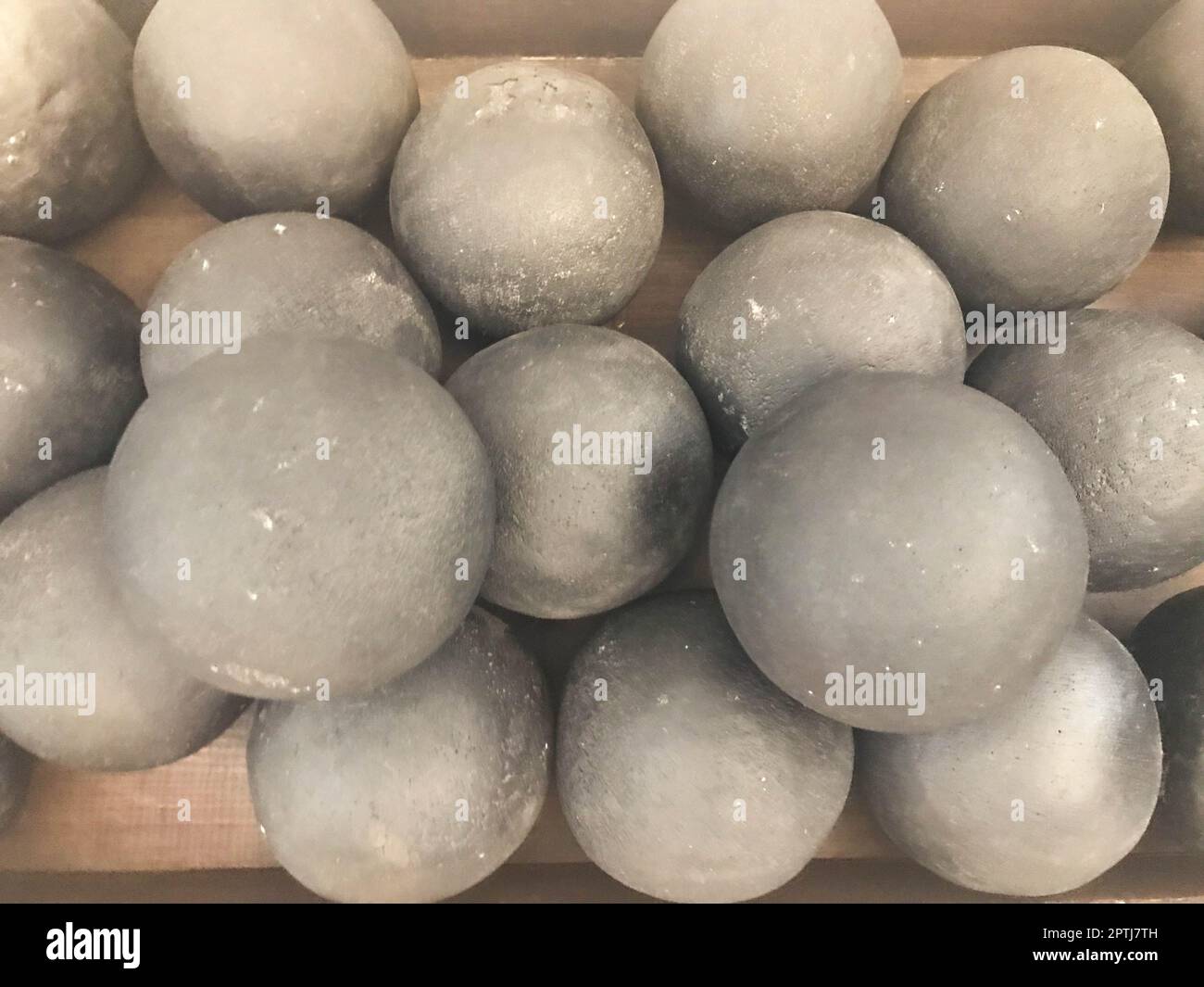 Texture of old antique combat round gray metallic, iron, stone cannon