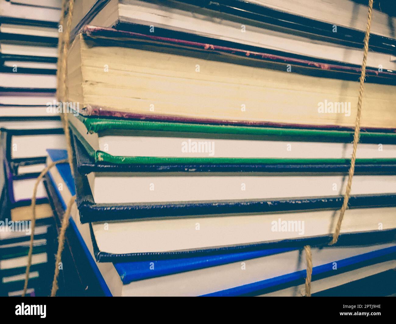 Wallpaper Ropes Book Pile of old books with rope background Stock Photo - Alamy