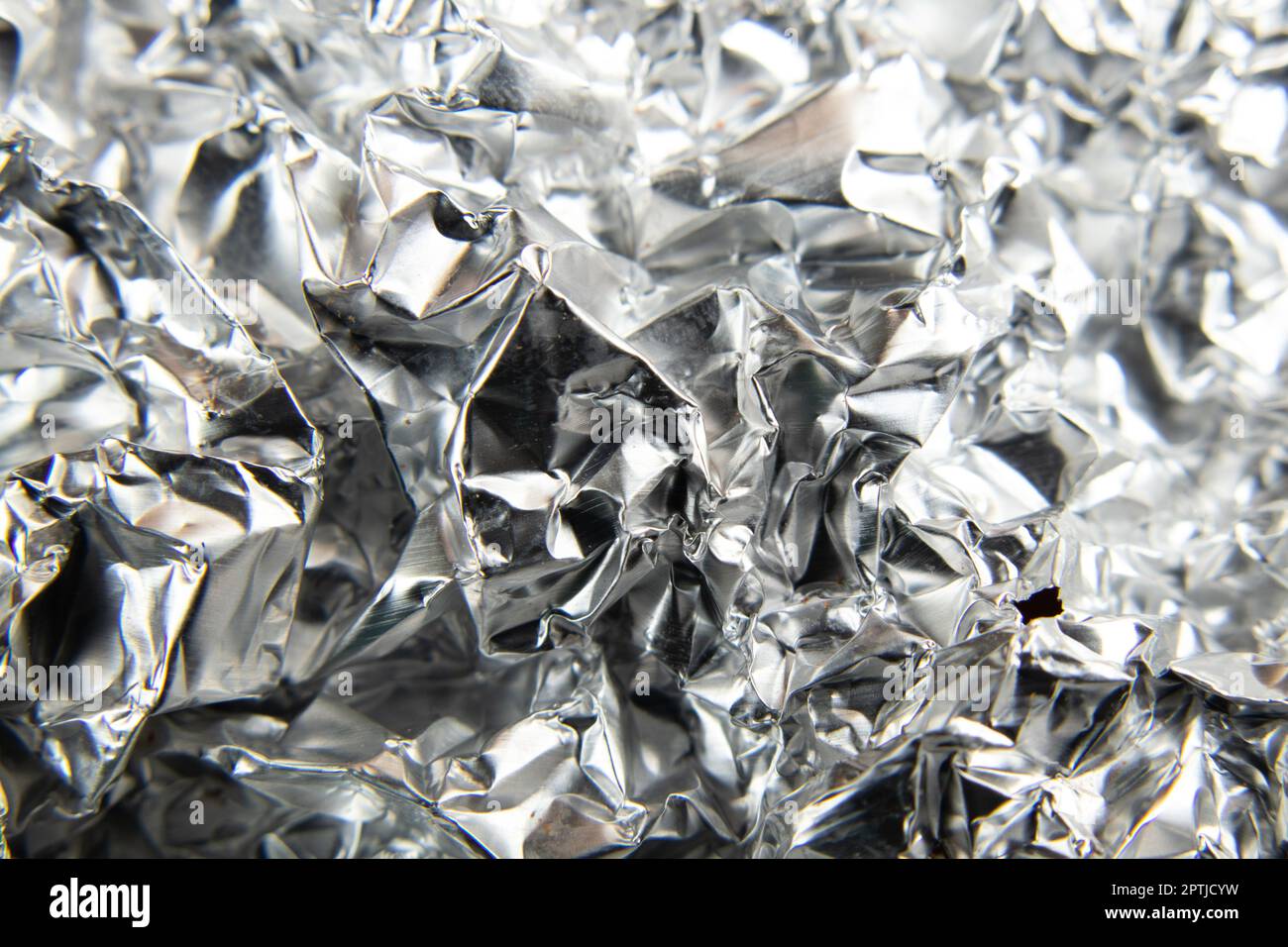 Rumpled foil hi-res stock photography and images - Alamy