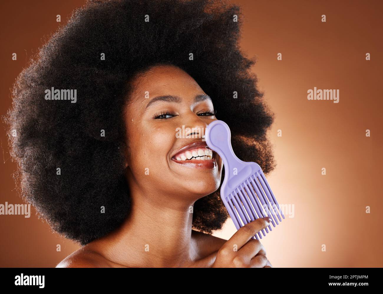 Curly hair, beauty comb and black woman, afro hairstyle and cosmetics of hair  salon perm on studio background. Portrait happy african, hair brush and  Stock Photo - Alamy