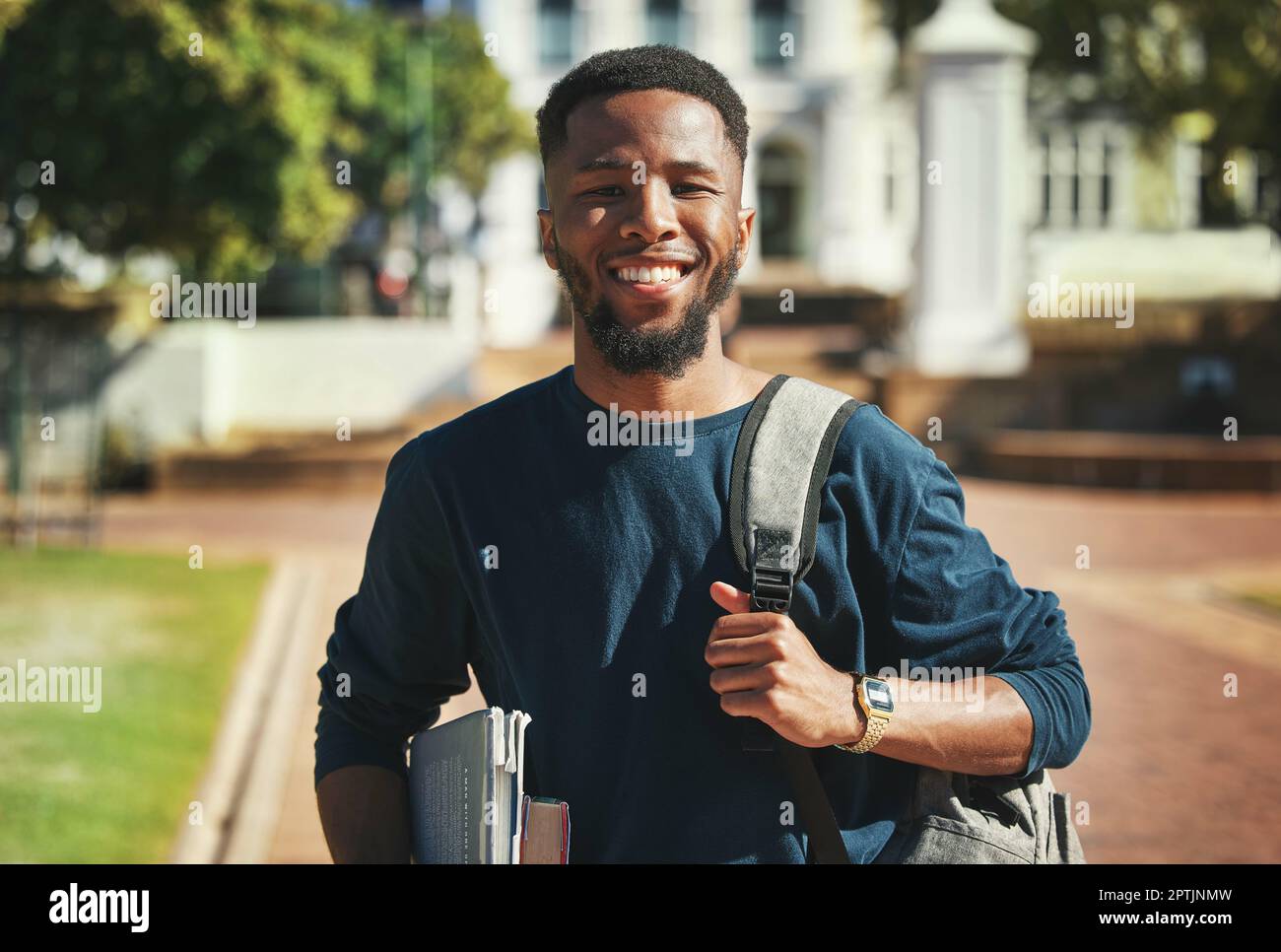 Education, campus and university portrait of student with books ...