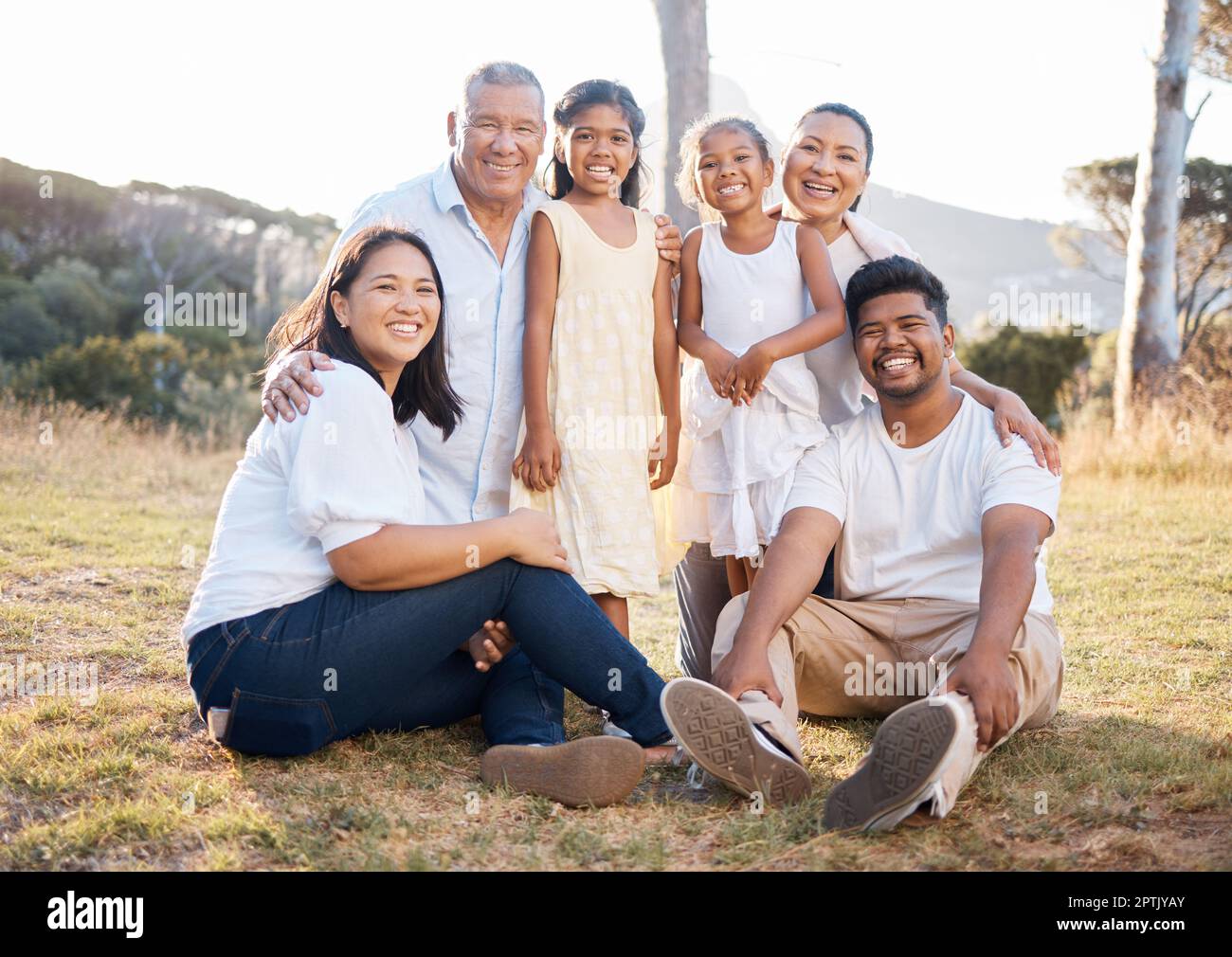 Big family, hug and outdoor park with mother, children and grandparents