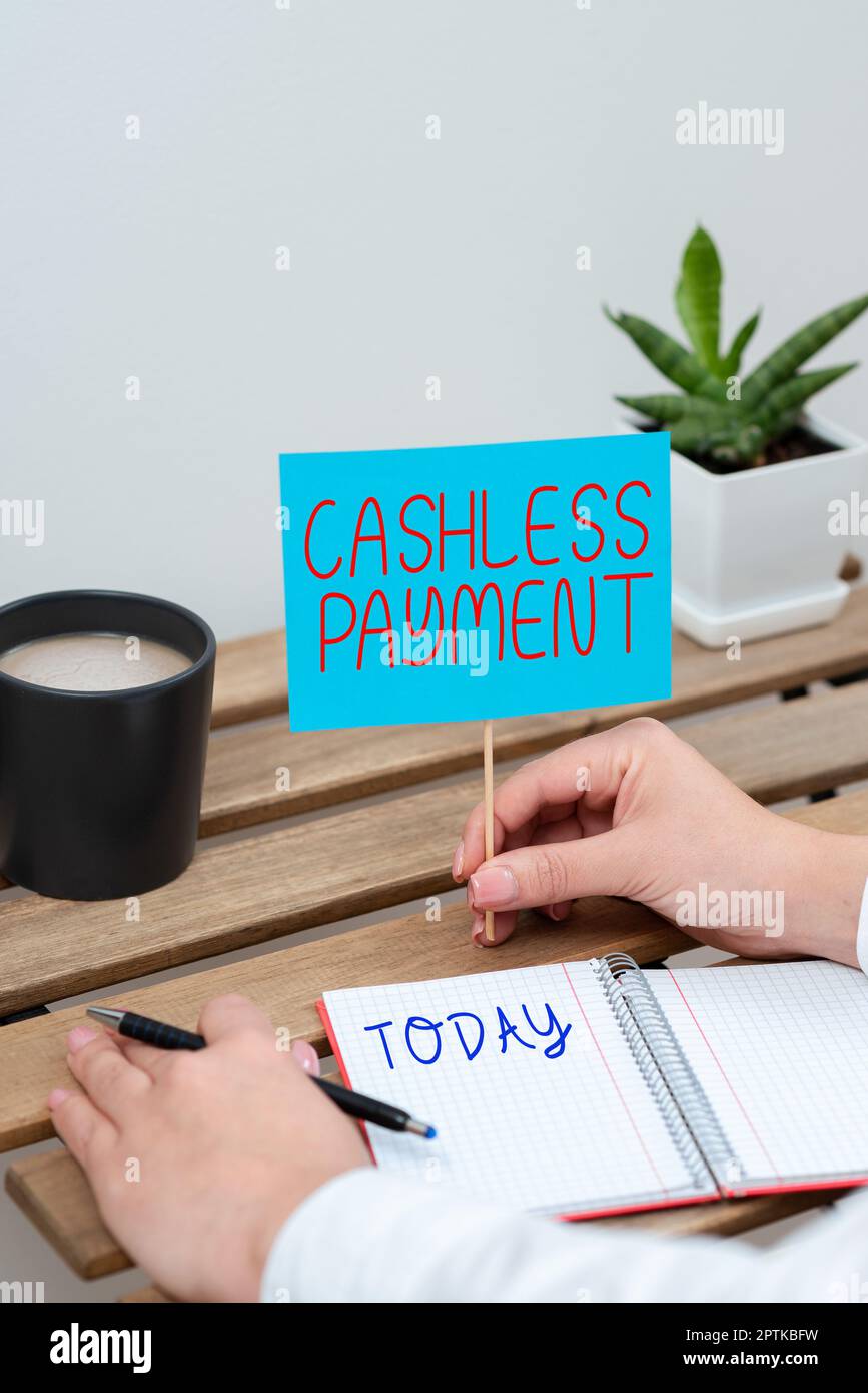 Hand writing sign Cashless Payment, Word Written on transaction will be ...