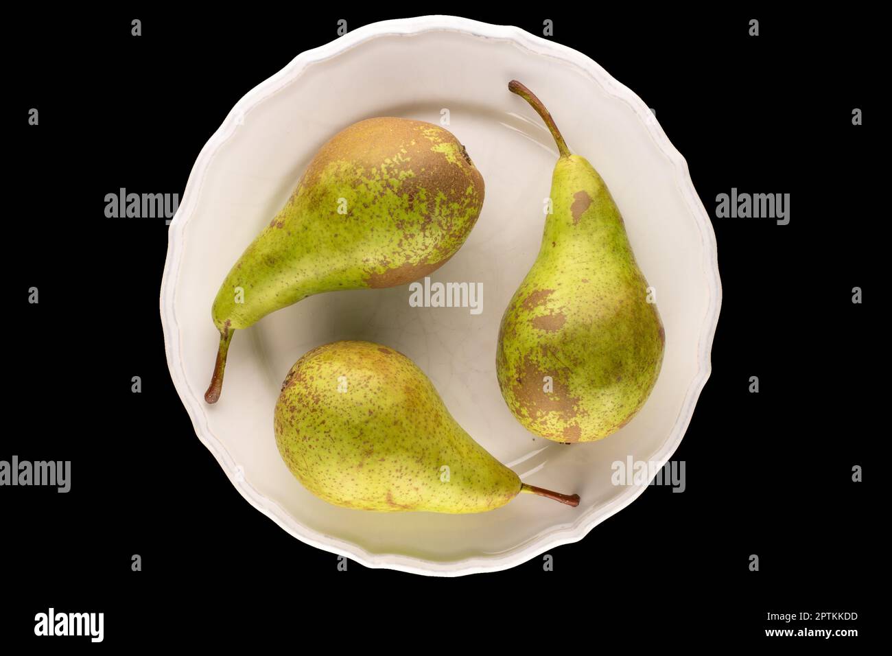 https://c8.alamy.com/comp/2PTKKDD/three-organic-pears-in-white-ceramic-plate-isolated-on-black-background-top-view-macro-2PTKKDD.jpg