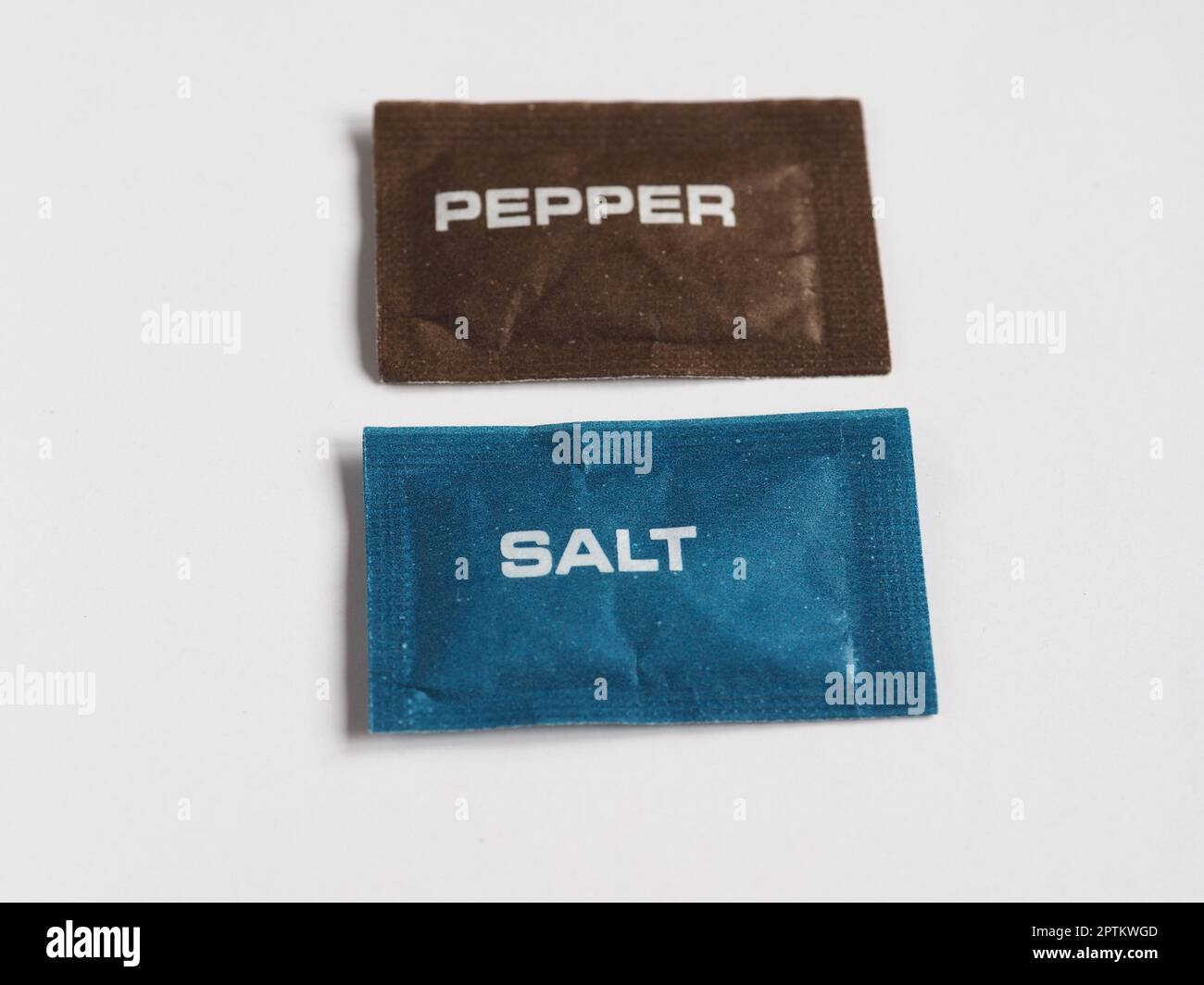single dose salt and pepper sachet for restaurants and pubs Stock Photo