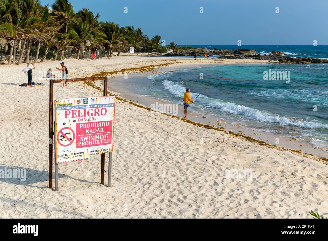 Peligro Danger sign swimming prohibited, Playa Secreto beach, Isla