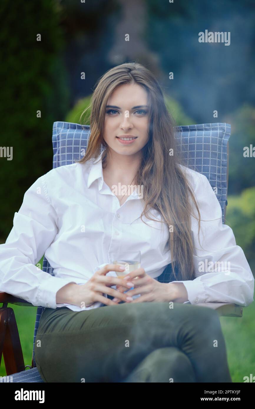 Portrait of cute young woman hi-res stock photography and images - Alamy