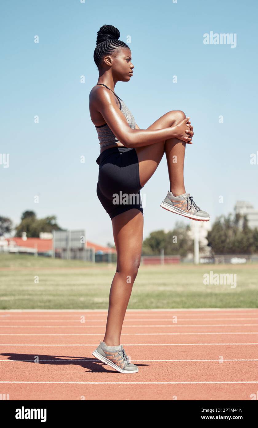 Black woman, running track and stretching in fitness workout