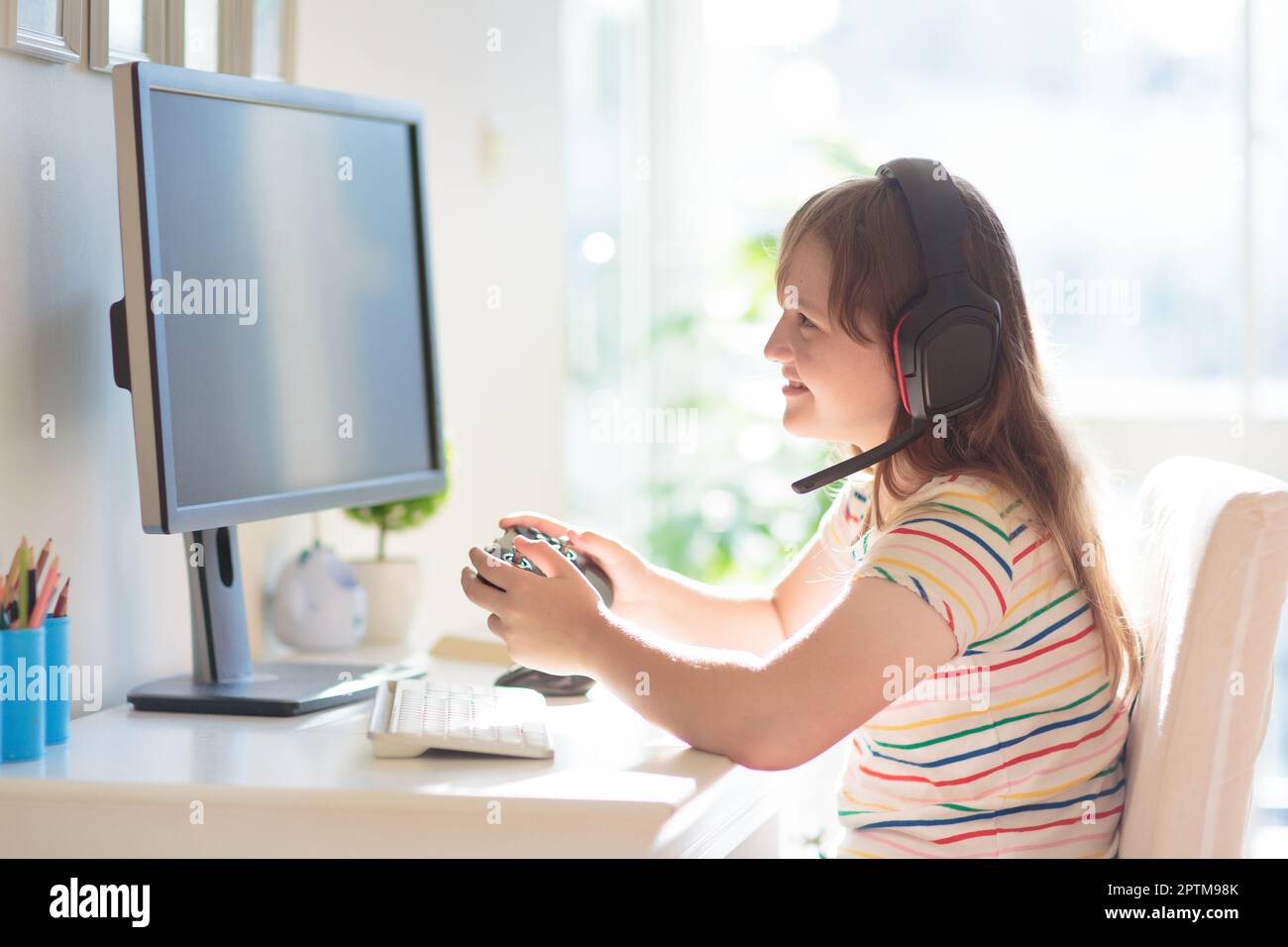 Child doing homework on computer. Online class. Homeschooling and ...