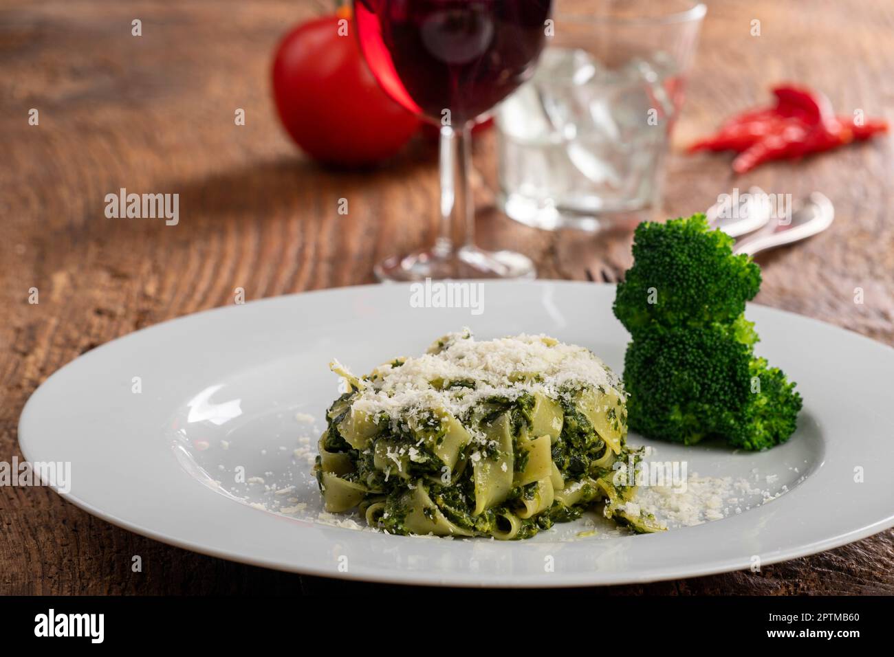 italian tagliatelli pasta with spinach sauce Stock Photo