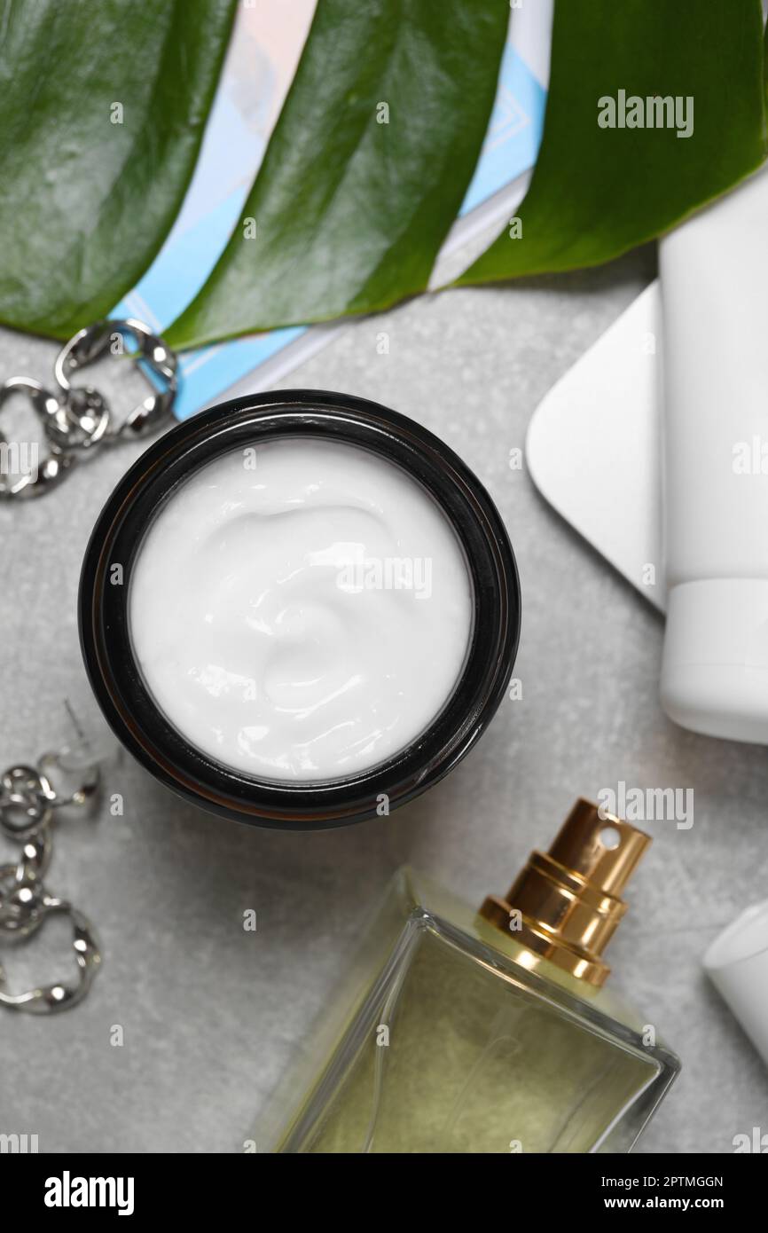 Flat lay composition with hand care cosmetic products on light grey ...