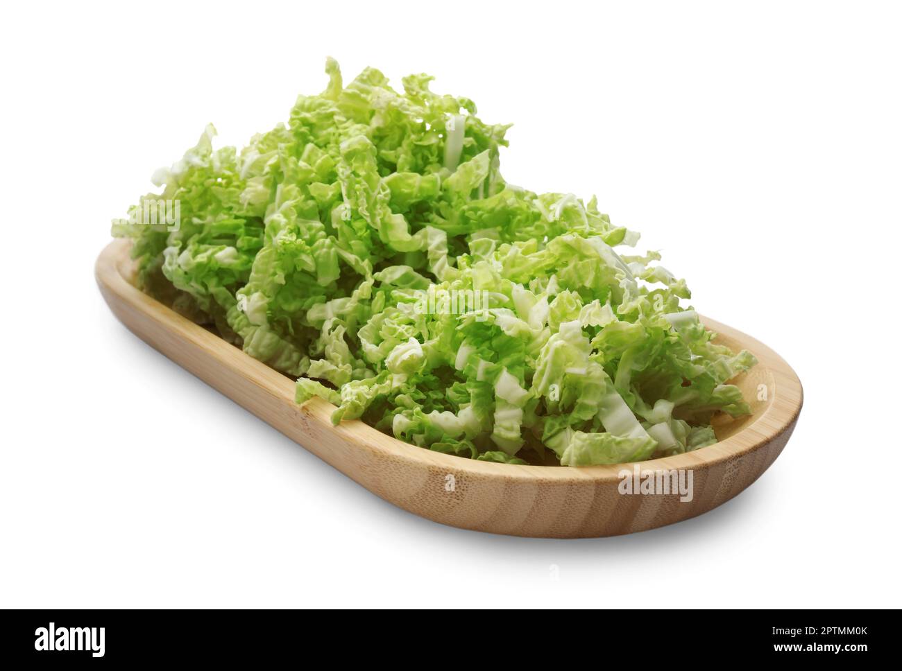 Wooden board with pile of chopped Chinese cabbage on white background ...
