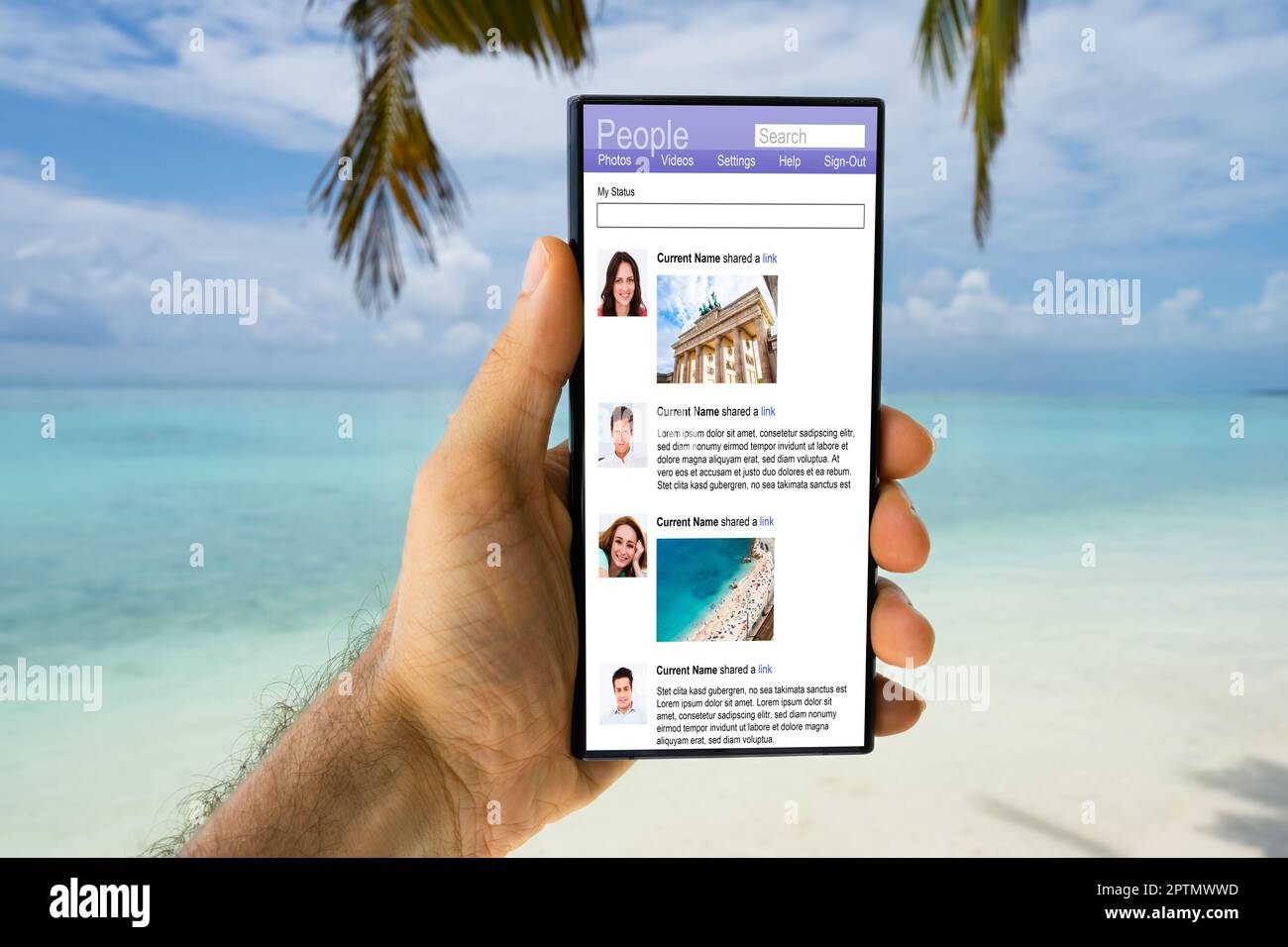 Mobile phone user on beach hi-res stock photography and images - Alamy