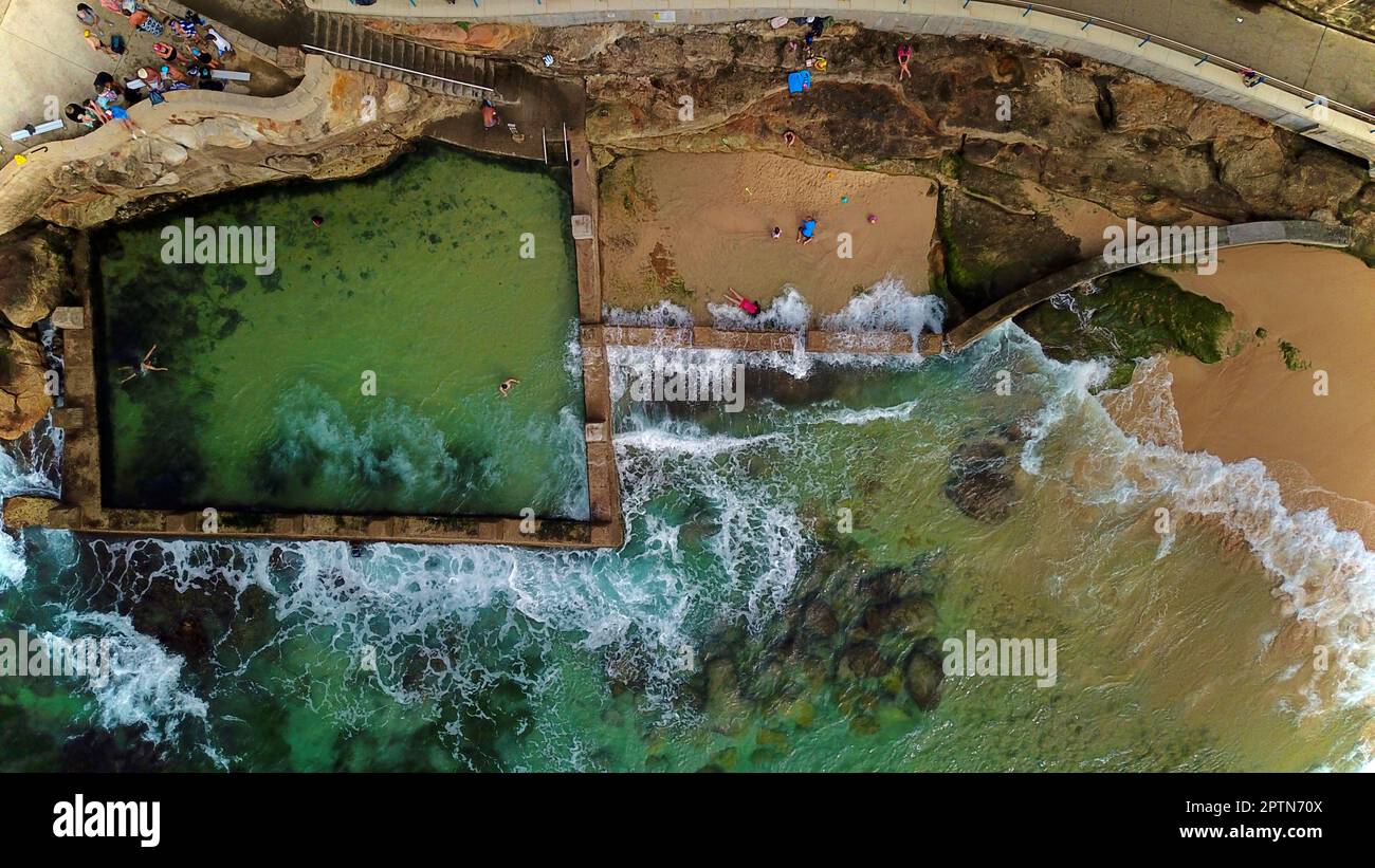 Aerial view of a Ocean Pool with waves clashing on it Stock Photo - Alamy