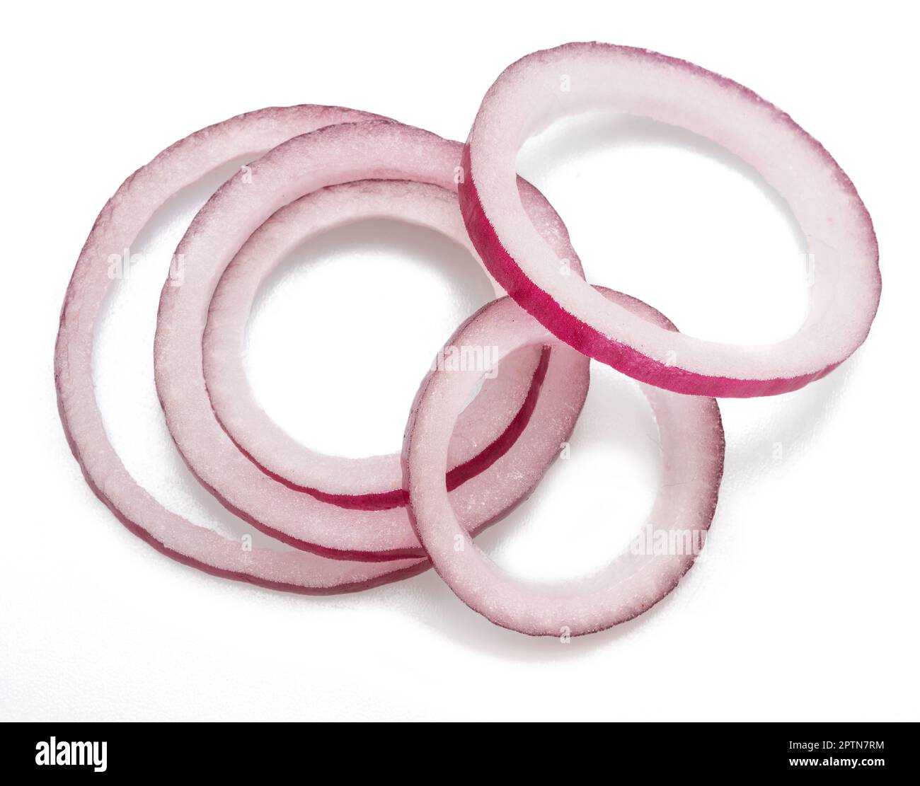 Red onion rings close-up on white background. Stock Photo
