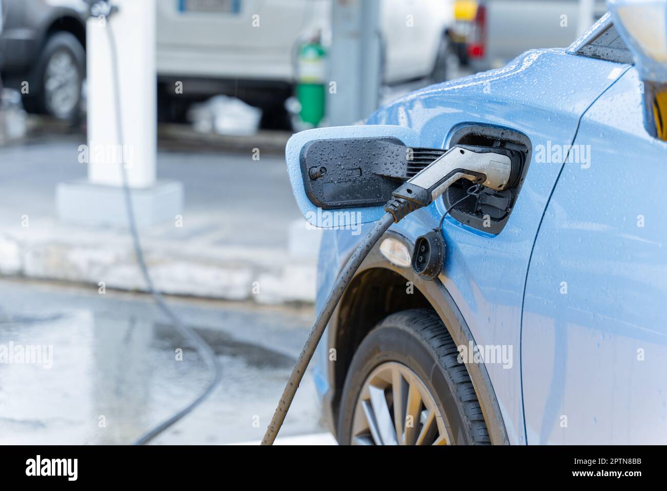 Electric car on electric car charging station. Power supply for electric car charging. Clean